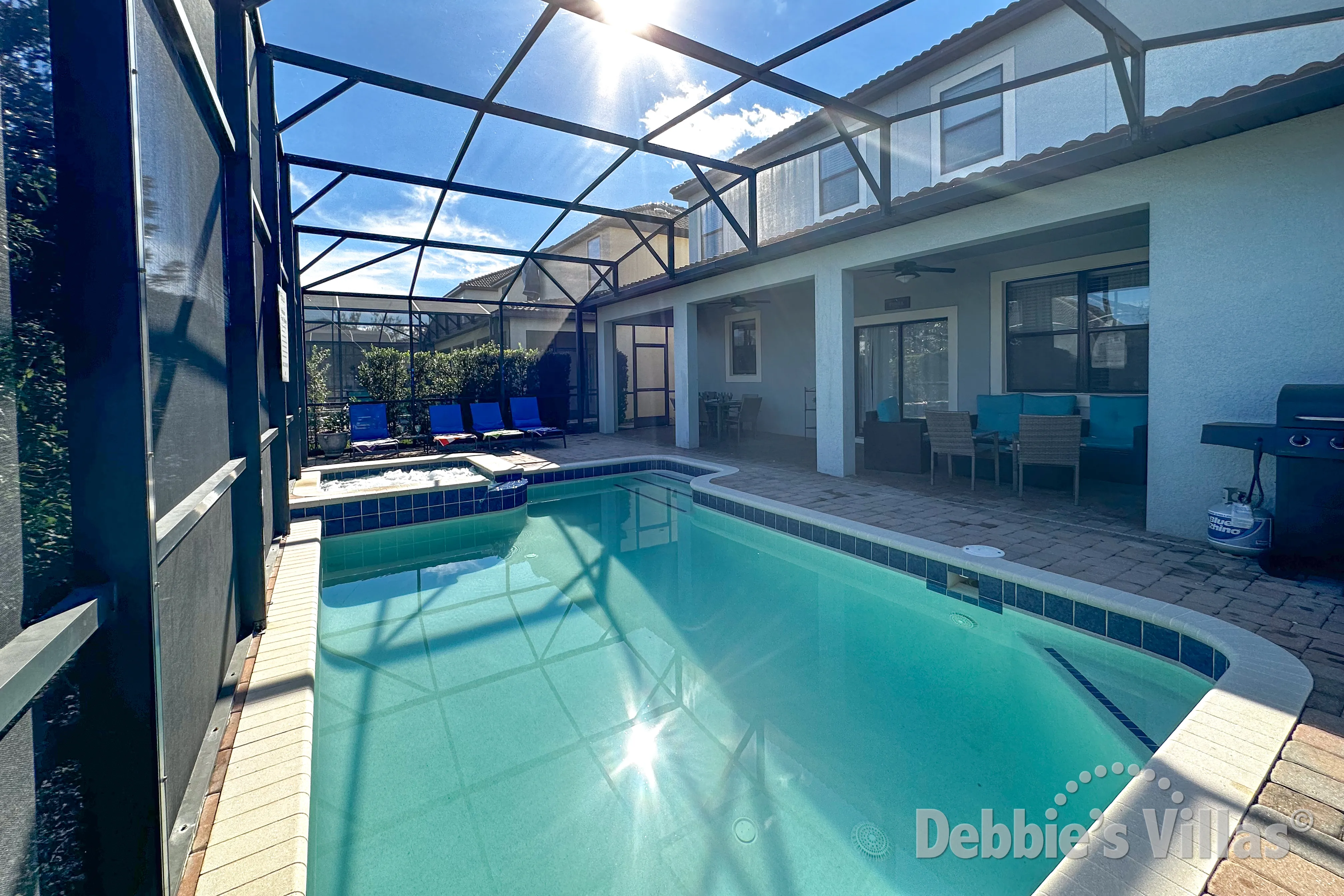 Sun drenched pool and spa at this ChampionsGate vacation villa