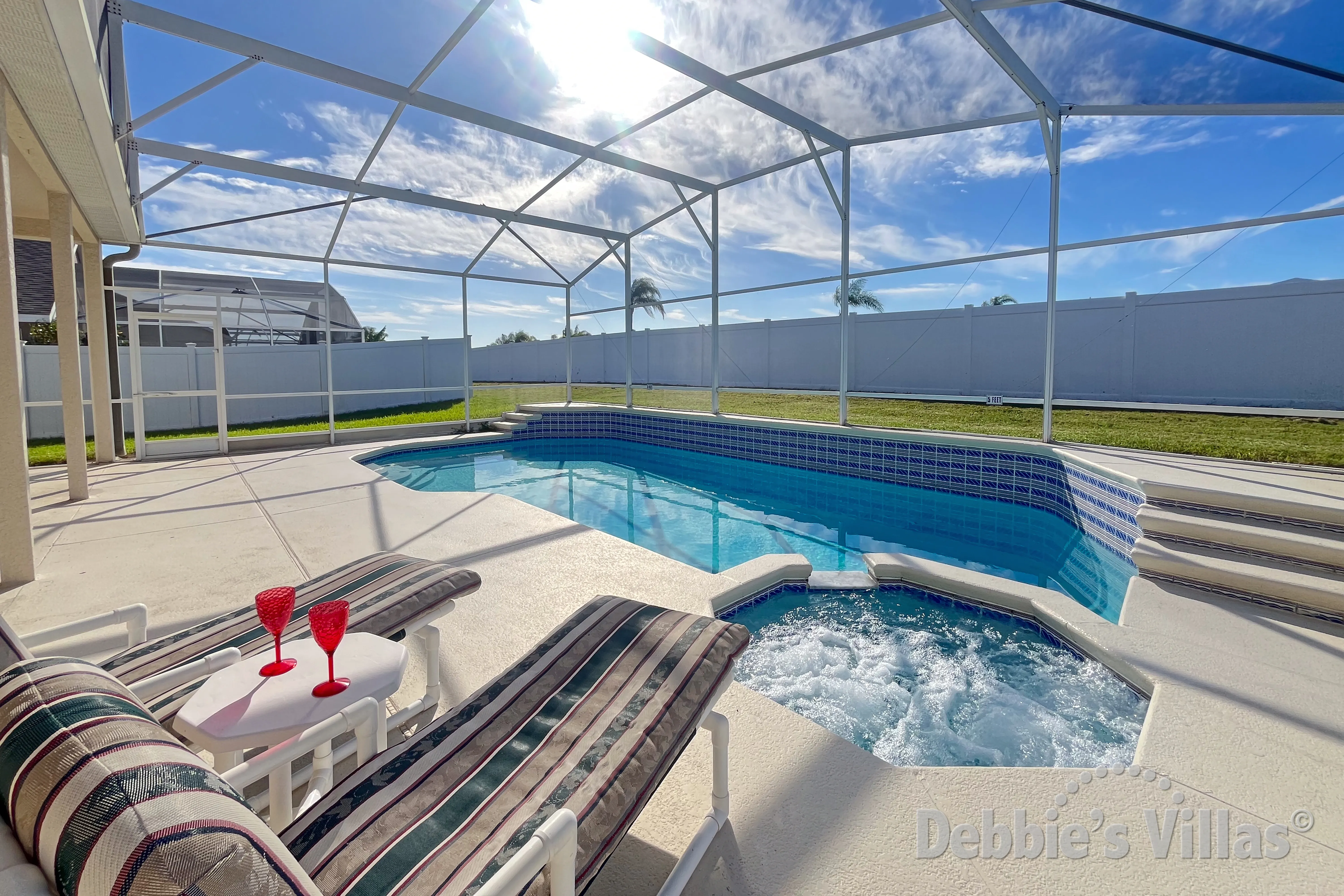 Private south-facing pool and spa at this vacation villa on Hampton Lakes in Davenport