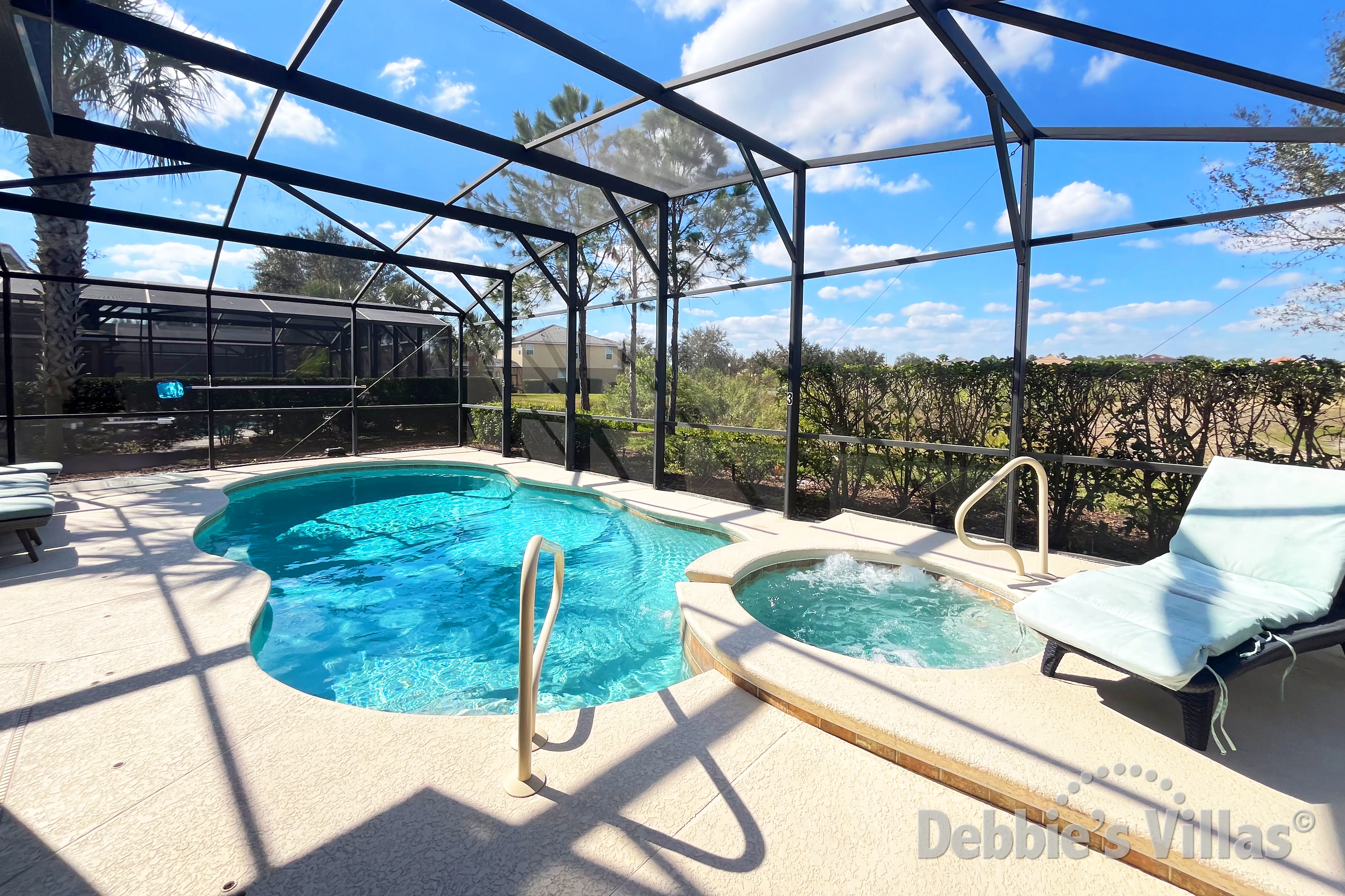 Northwest-facing pool and spa at this vacation villa on Solterra in Davenport