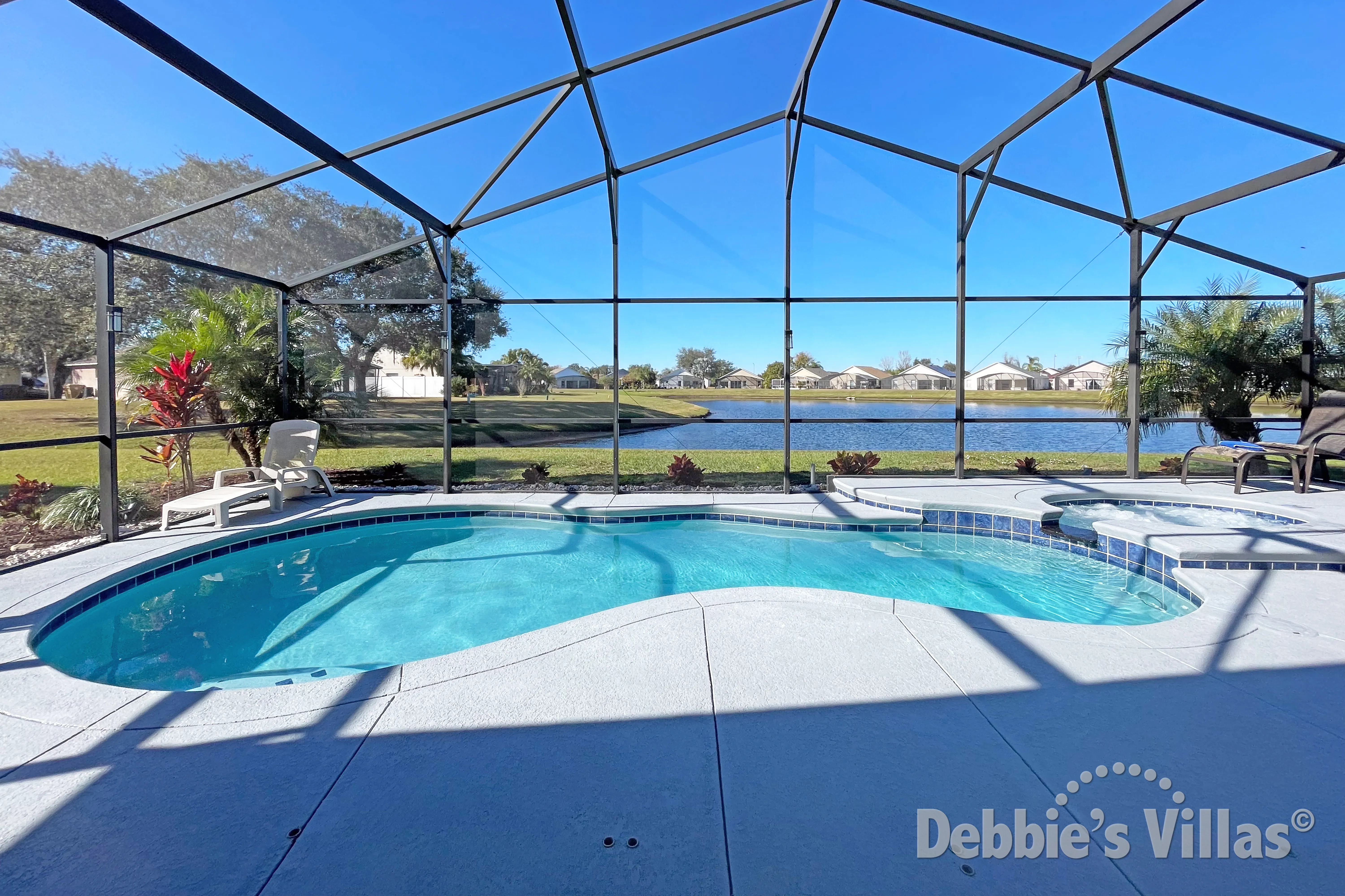 Northwest-facing pool and spa at this vacation villa on Crescent Lakes in Kissimmee