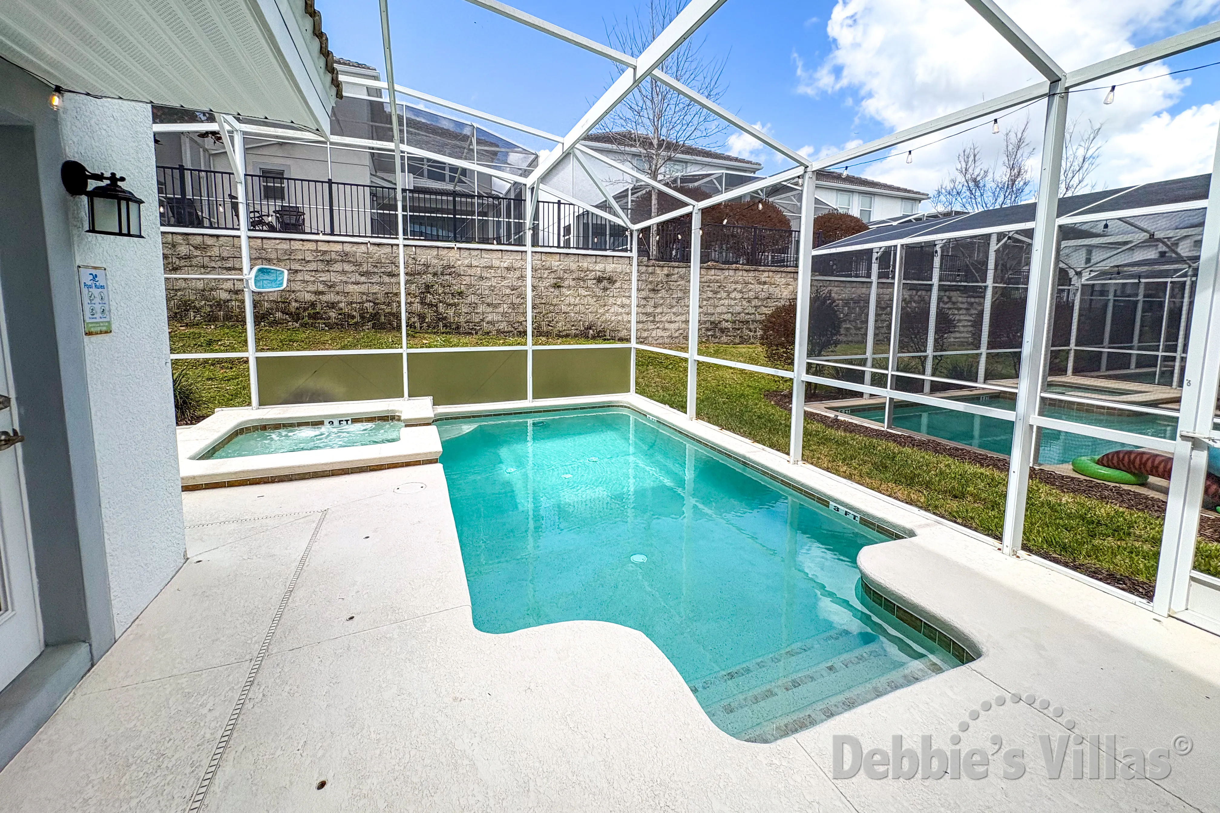 West-facing pool and spa at this vacation villa on ChampionsGate in Davenport