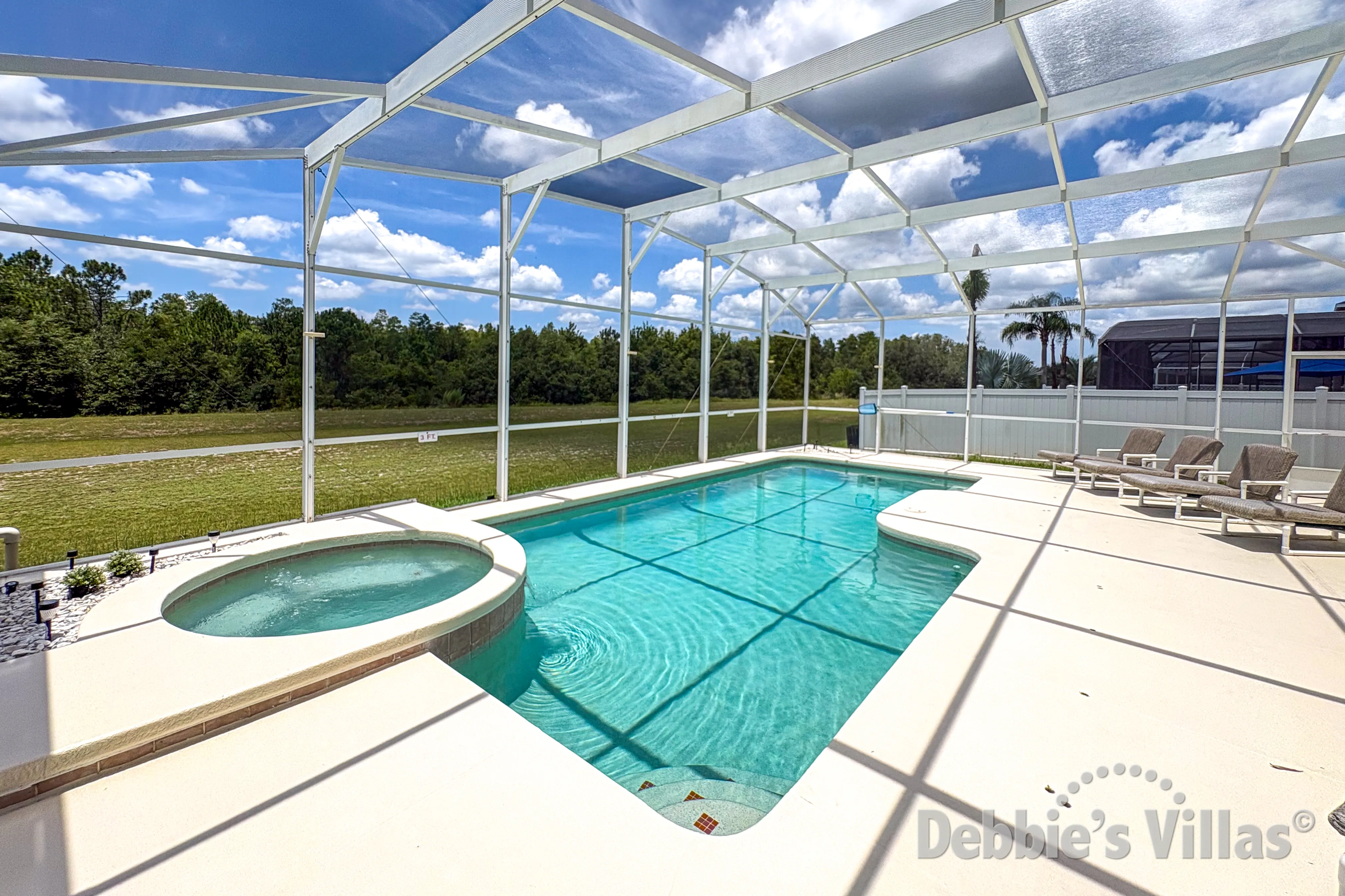 West-facing pool and spa at this vacation villa on Highlands Reserve in Davenport