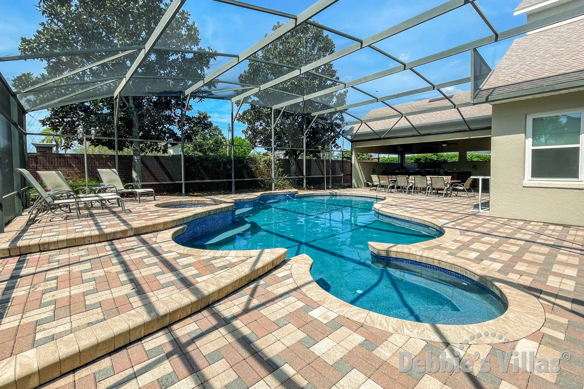 Spacious sun-drenched pool and spa deck at this Formosa Gardens vacation villa