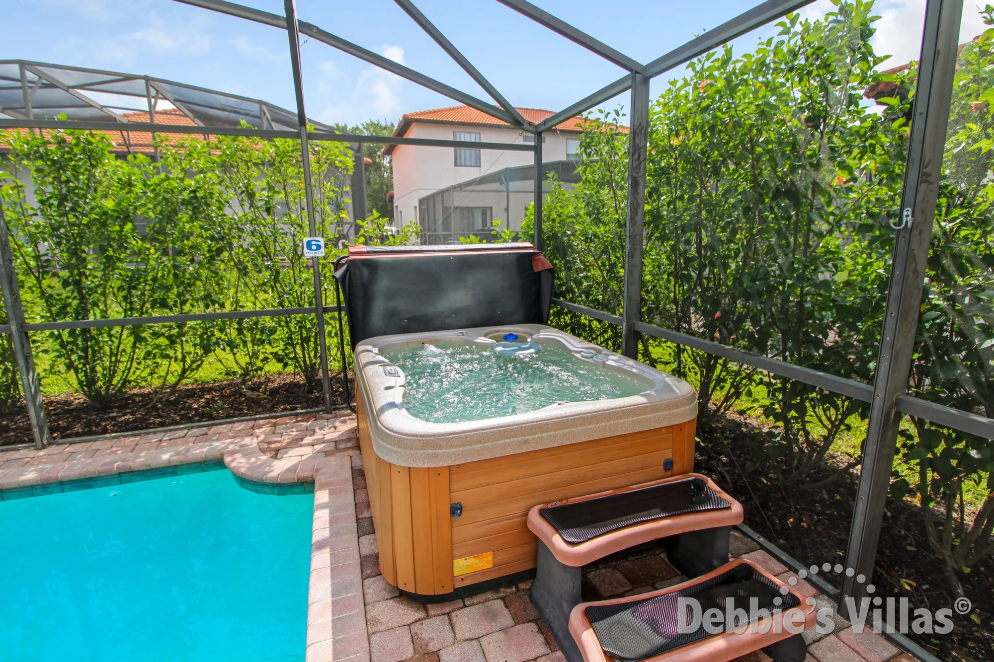 Spend time in the hot tub at this vacation villa in Orlando