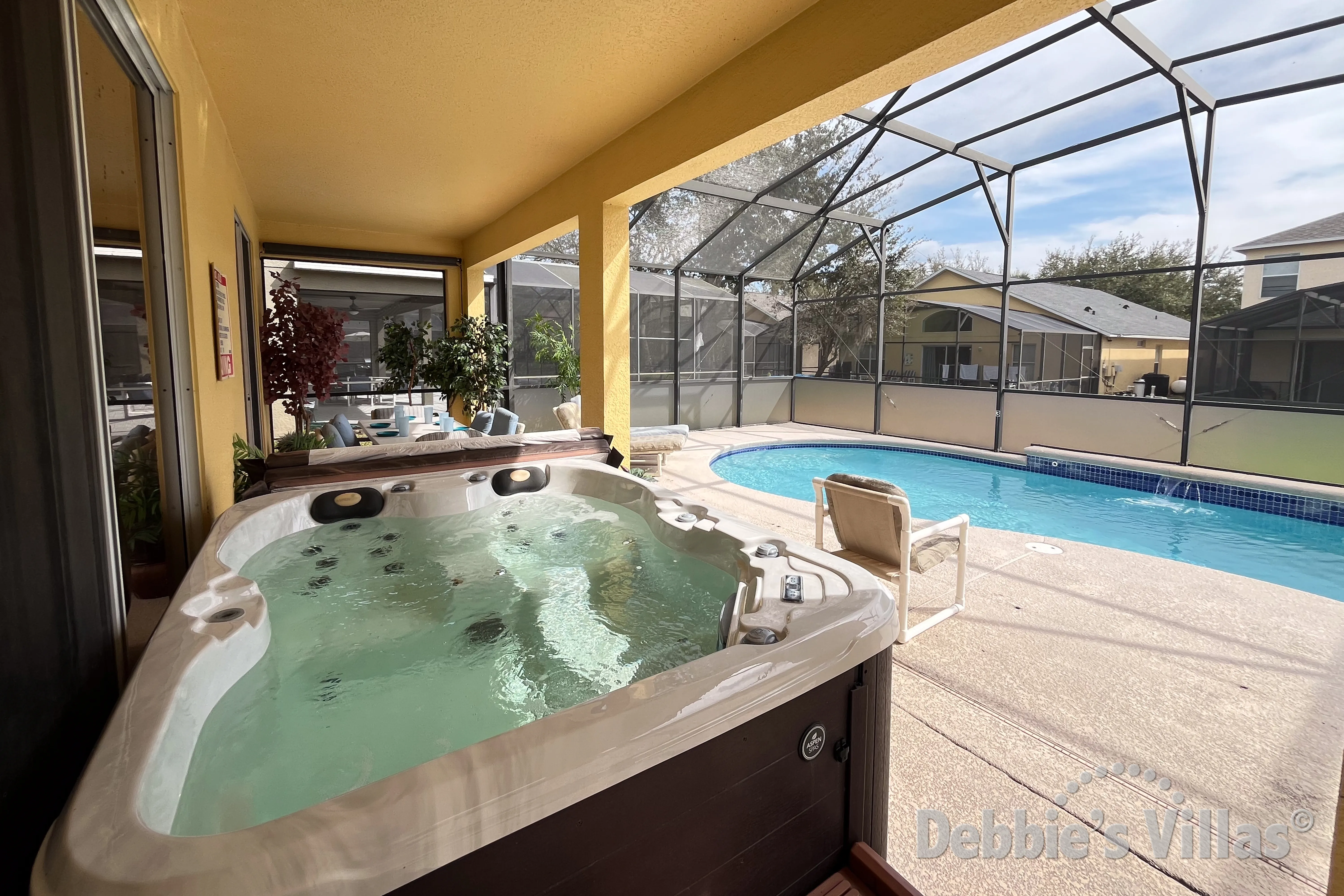 Enjoy a relaxing soak in the standalone hot tub at the south-facing pool