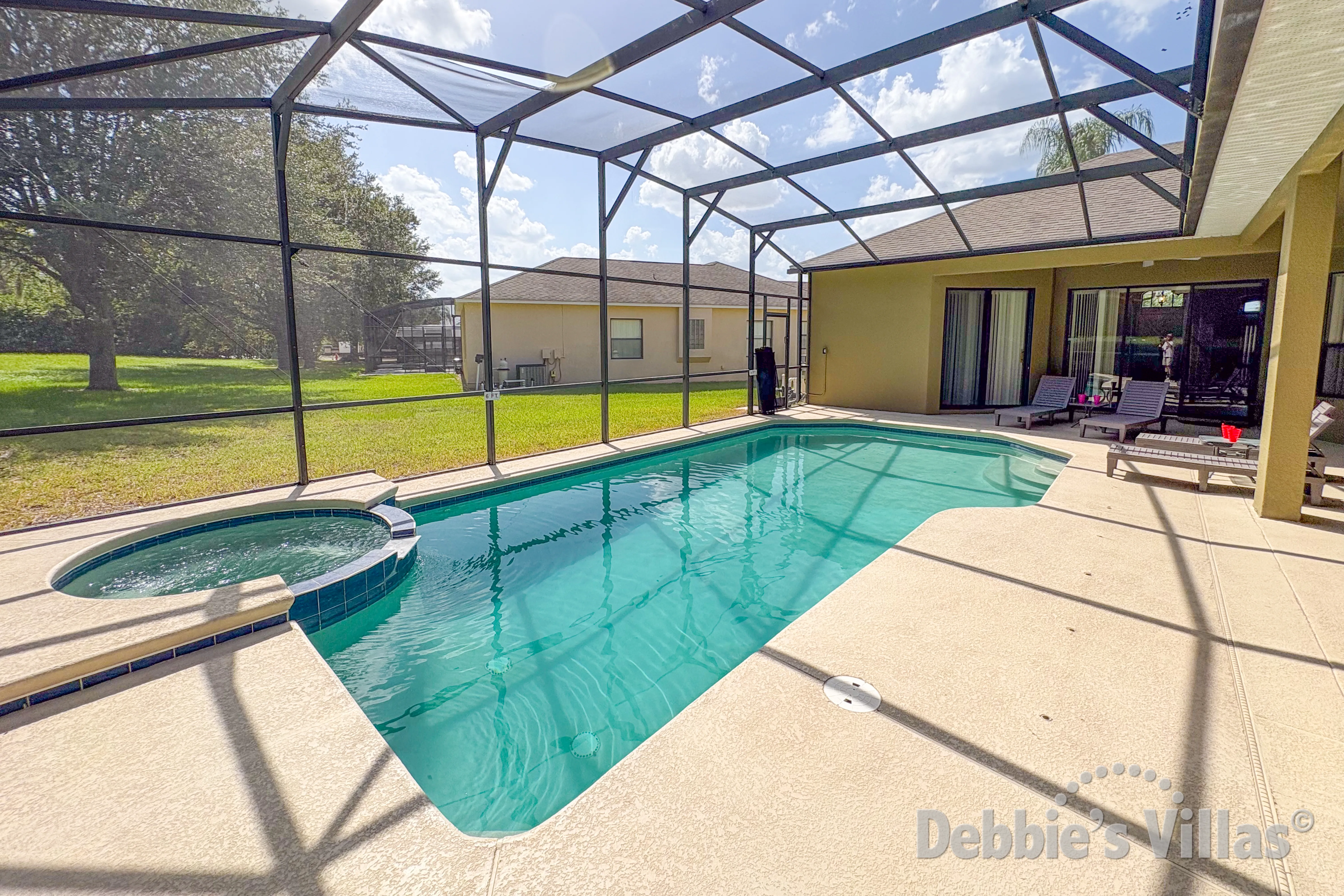 South-facing pool and spa at this vacation villa on The Estates at Legacy Park in Davenport 