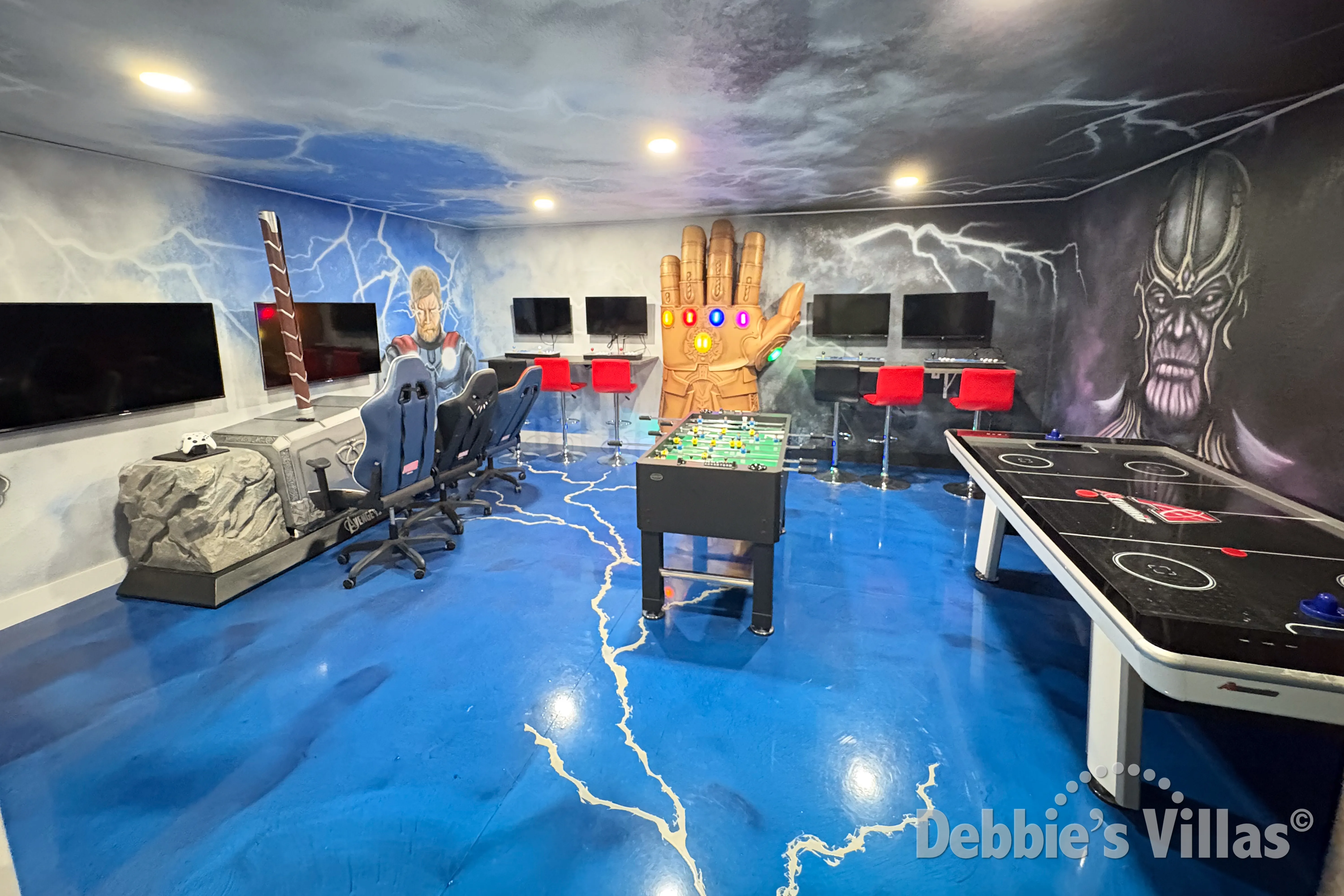 Avengers-themed air-conditioned games room in this Kissimmee vacation villa 