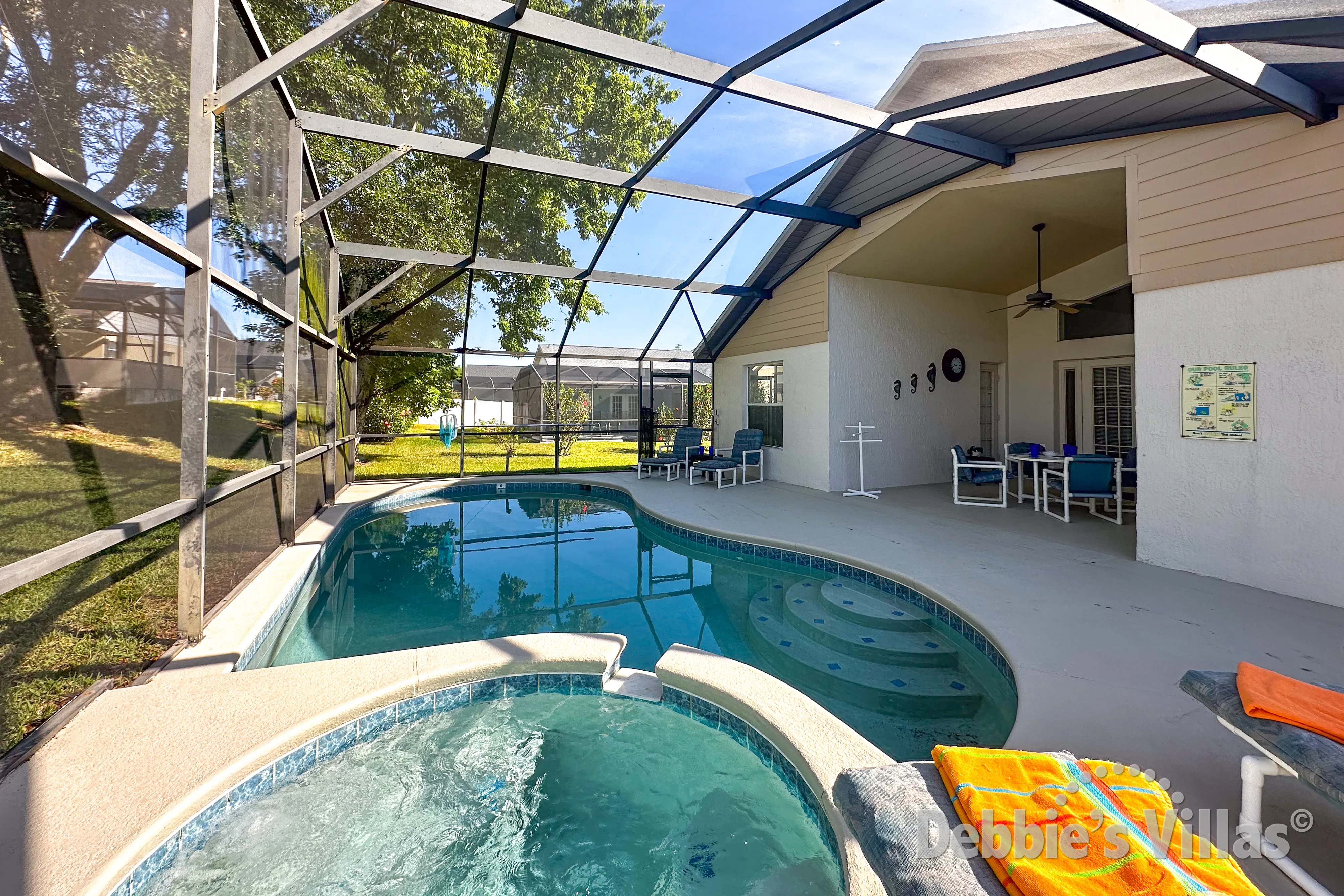West-facing pool and spa at this vacation villa on Orange Tree in Clermont