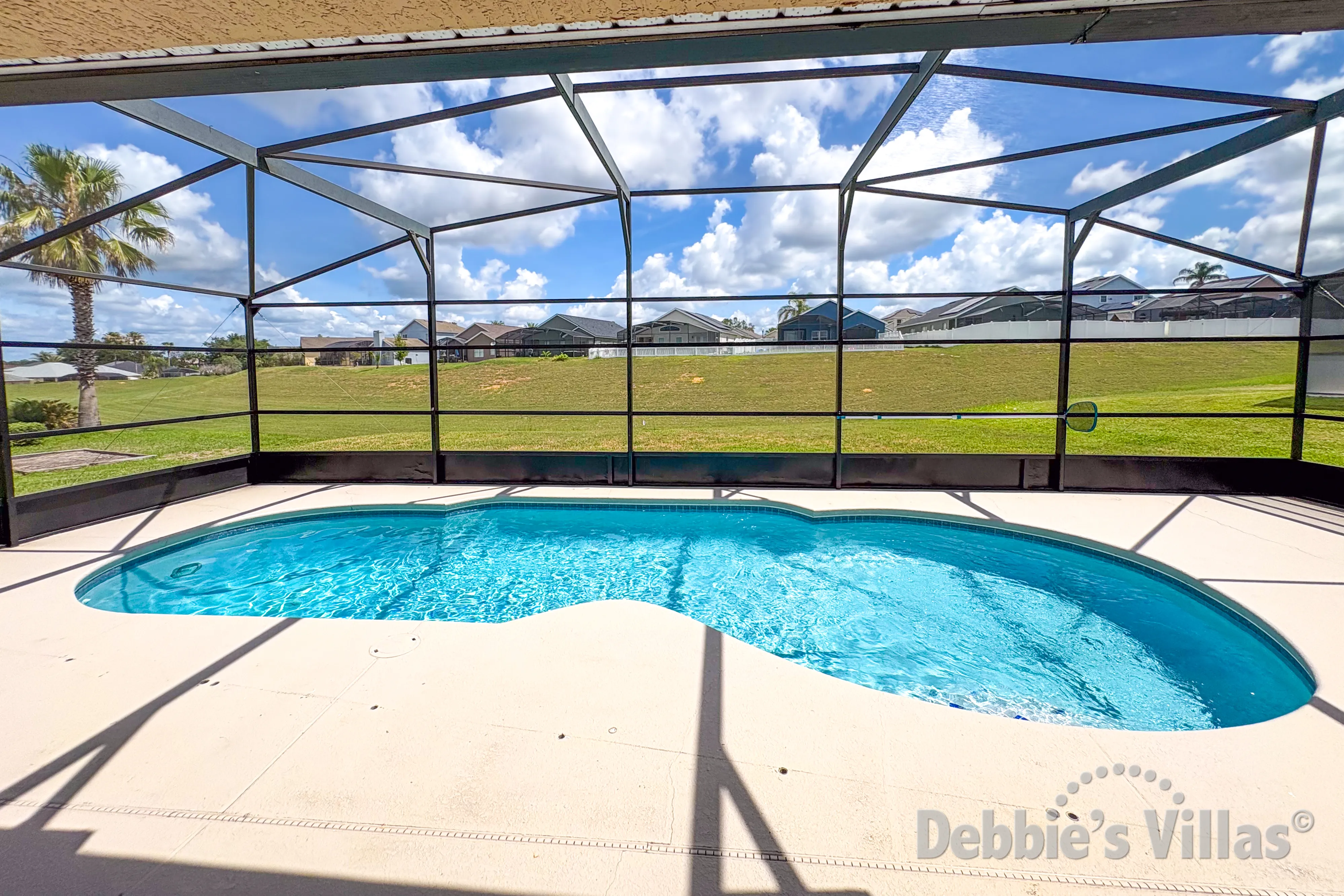 Swimming pool at this vacation villa on Tuscan Ridge in Davenport 