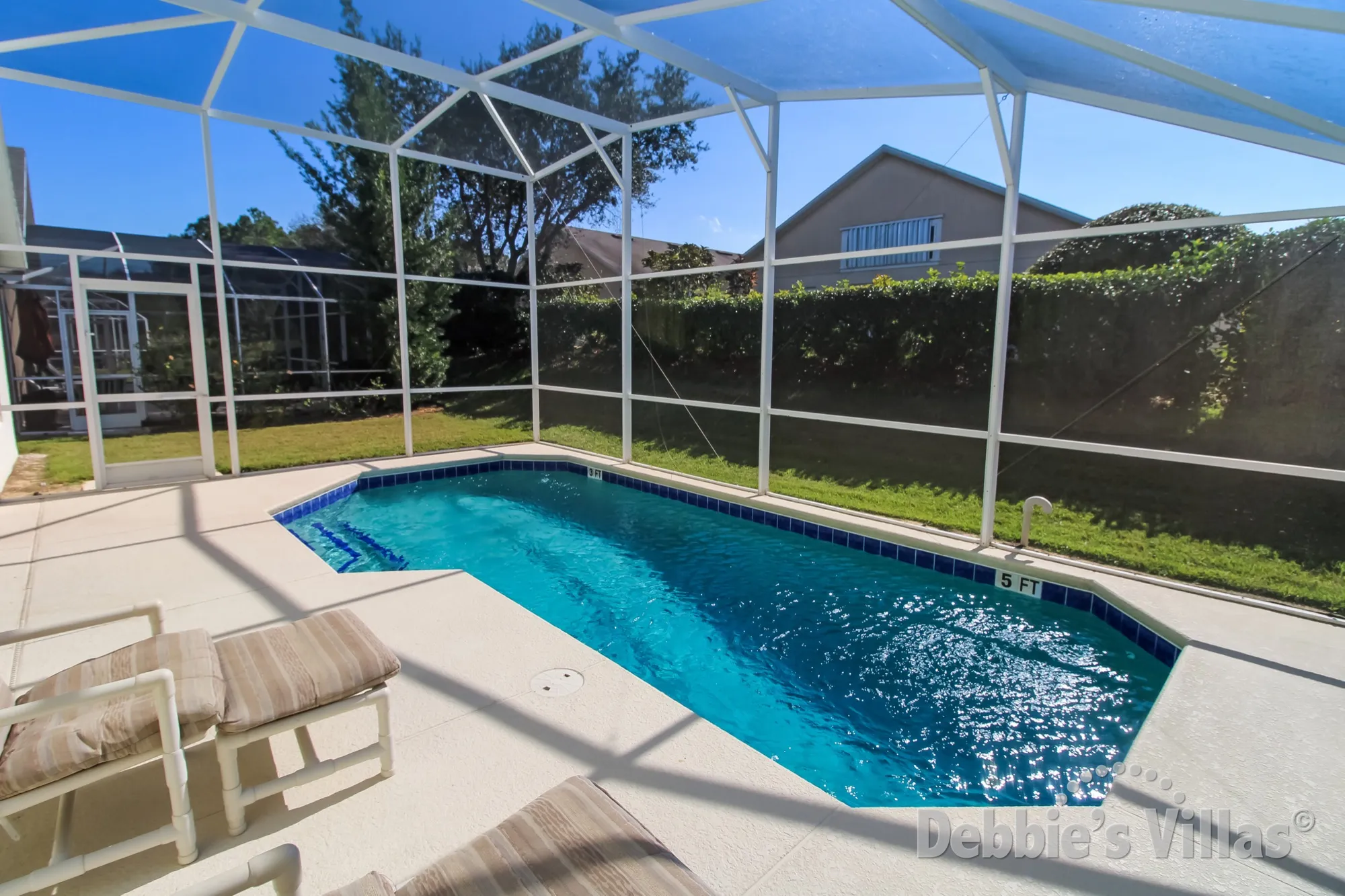 South-facing private pool at this villa on Westbury in Davenport