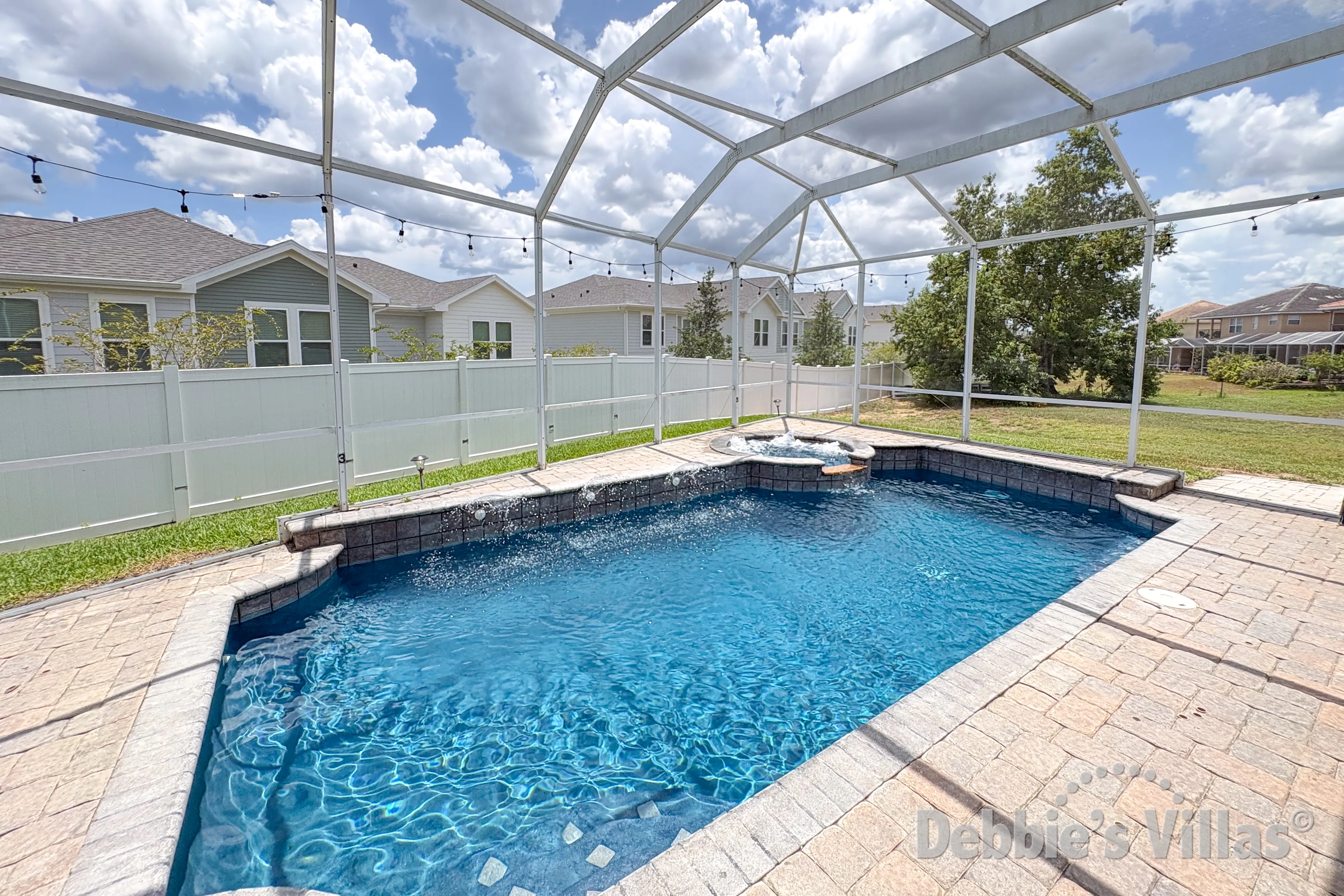 Pool and spa at this vacation villa on Vista Park in Davenport 
