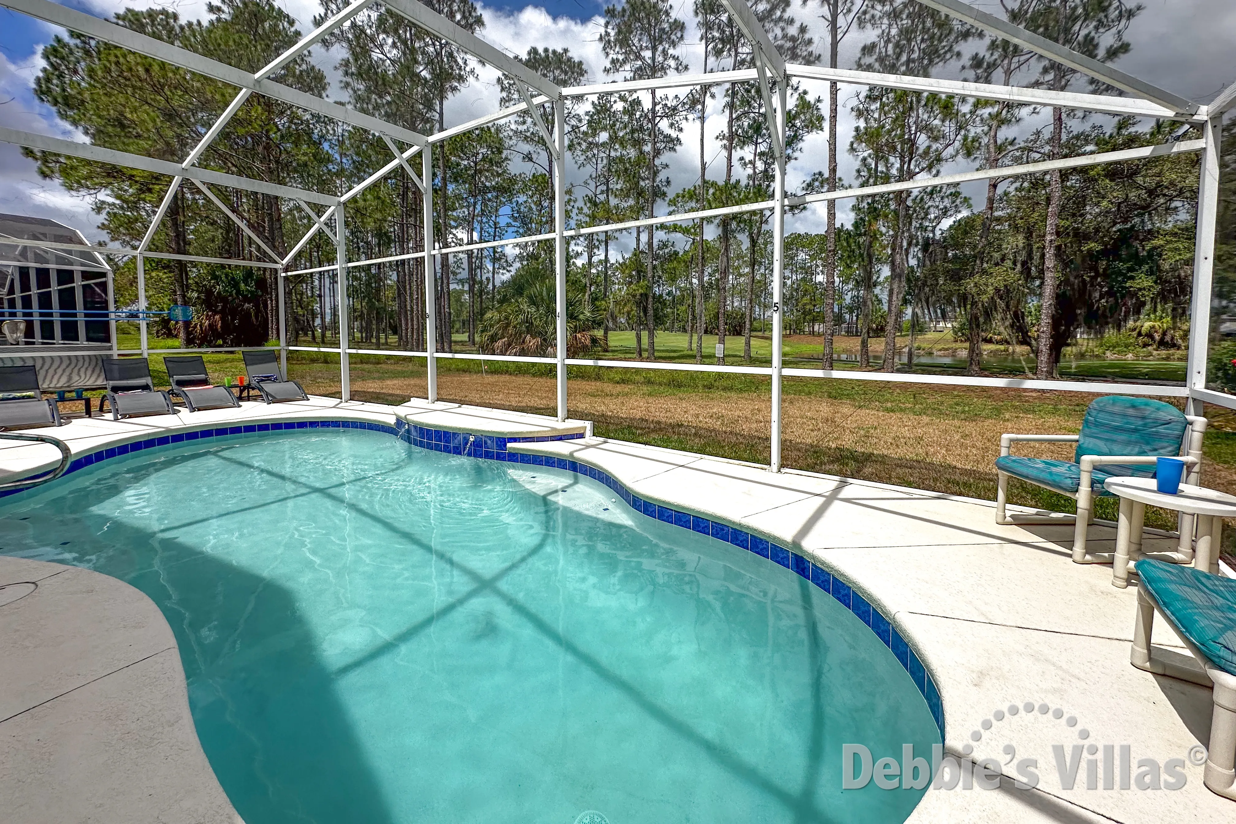 West-facing pool with conservation views at this vacation villa on Highlands Reserve in Davenport