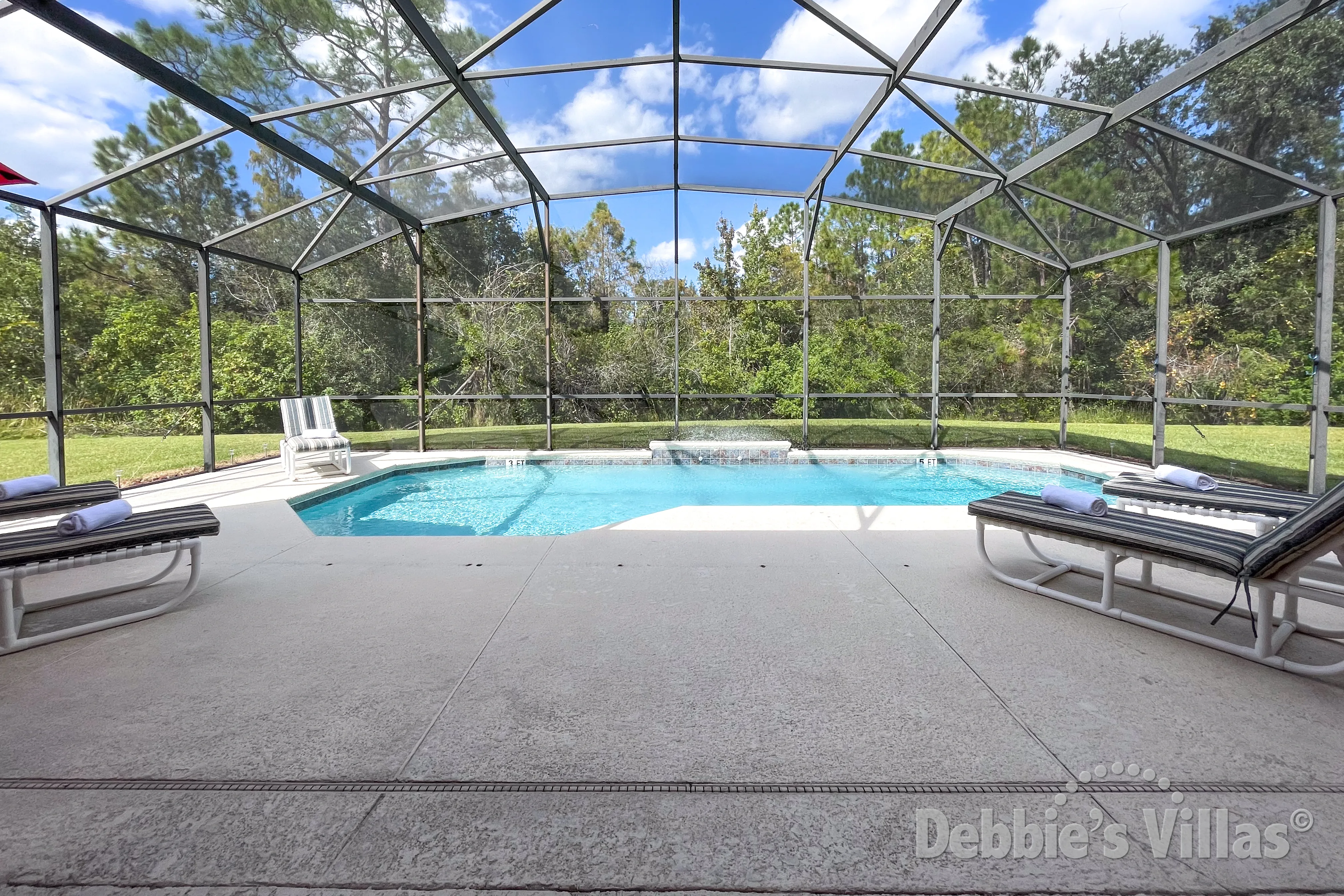 Conservation views from the pool and spa deck of this Terra Verde vacation villa