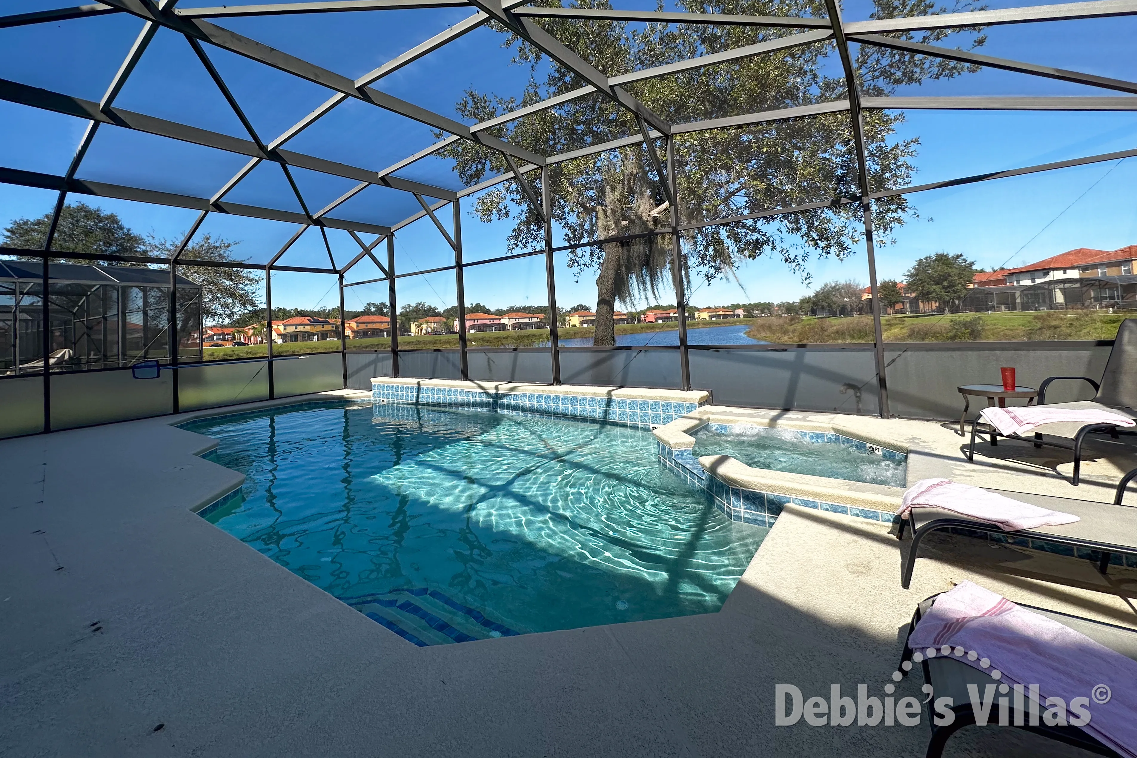 Stunning lake view from the pool deck of this Bella Vida vacation villa in Kissimmee