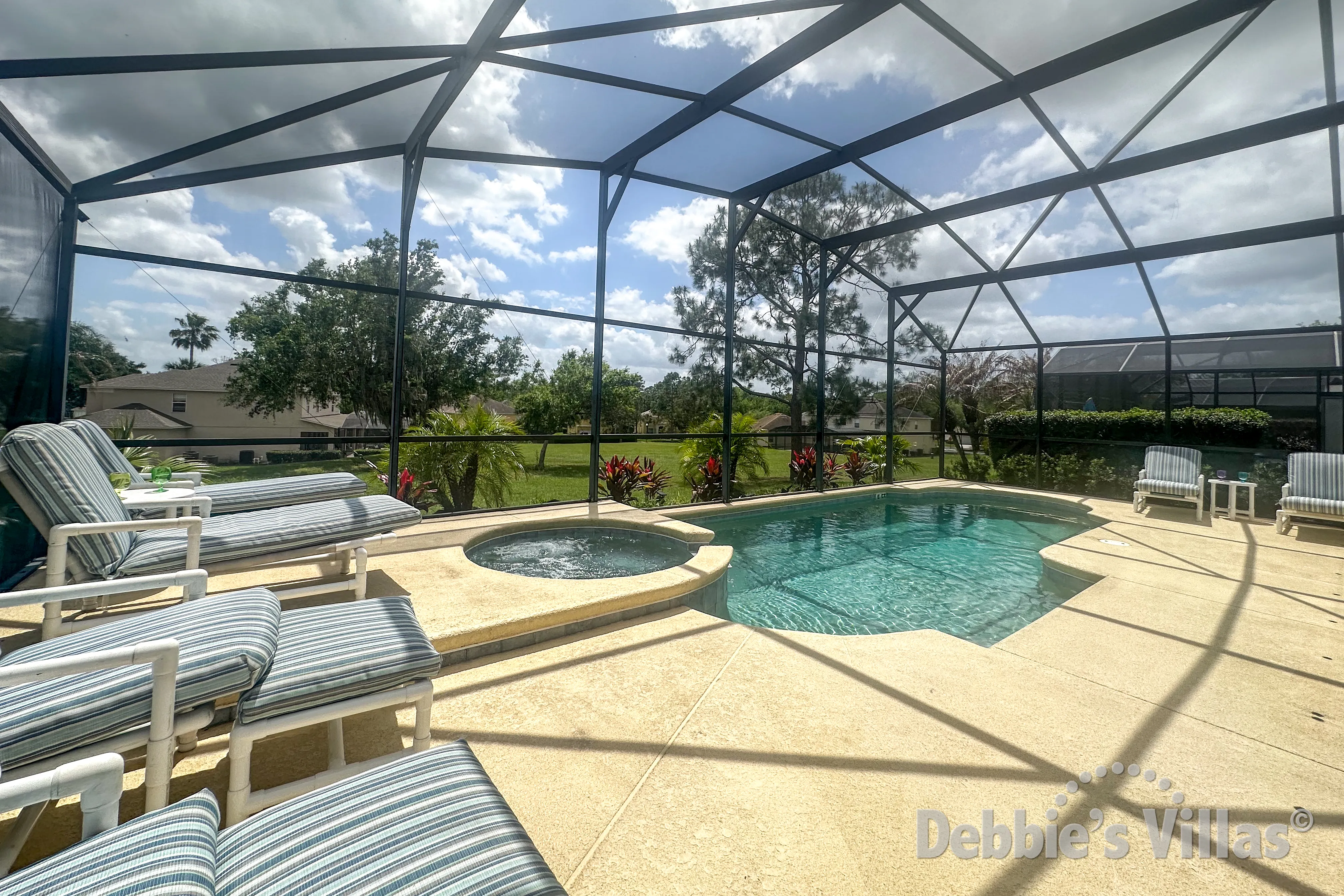 Southeast-facing pool and spa at this vacation villa on Emerald Island in Kissimmee 