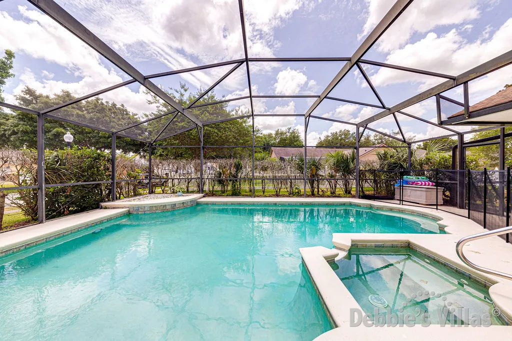 South-facing pool and spa at this vacation villa on Orange Tree in Clermont