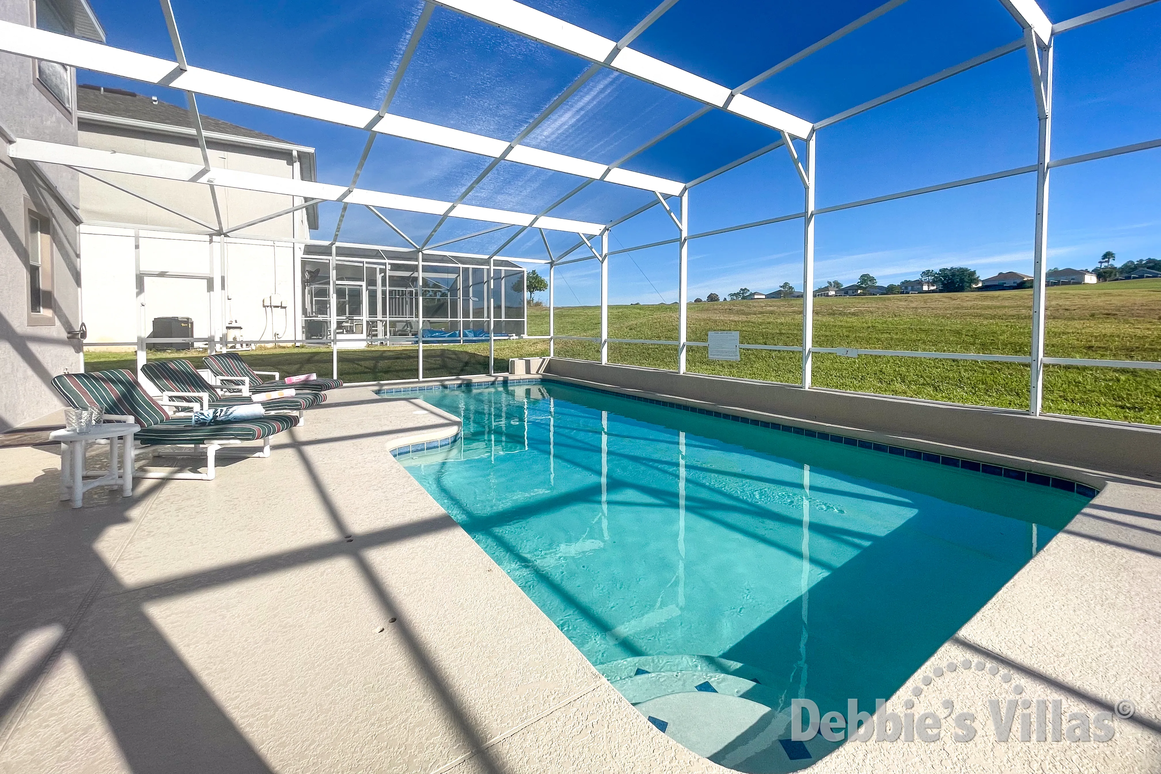Golf course view from the sunny pool deck at this Highlands Reserve vacation villa