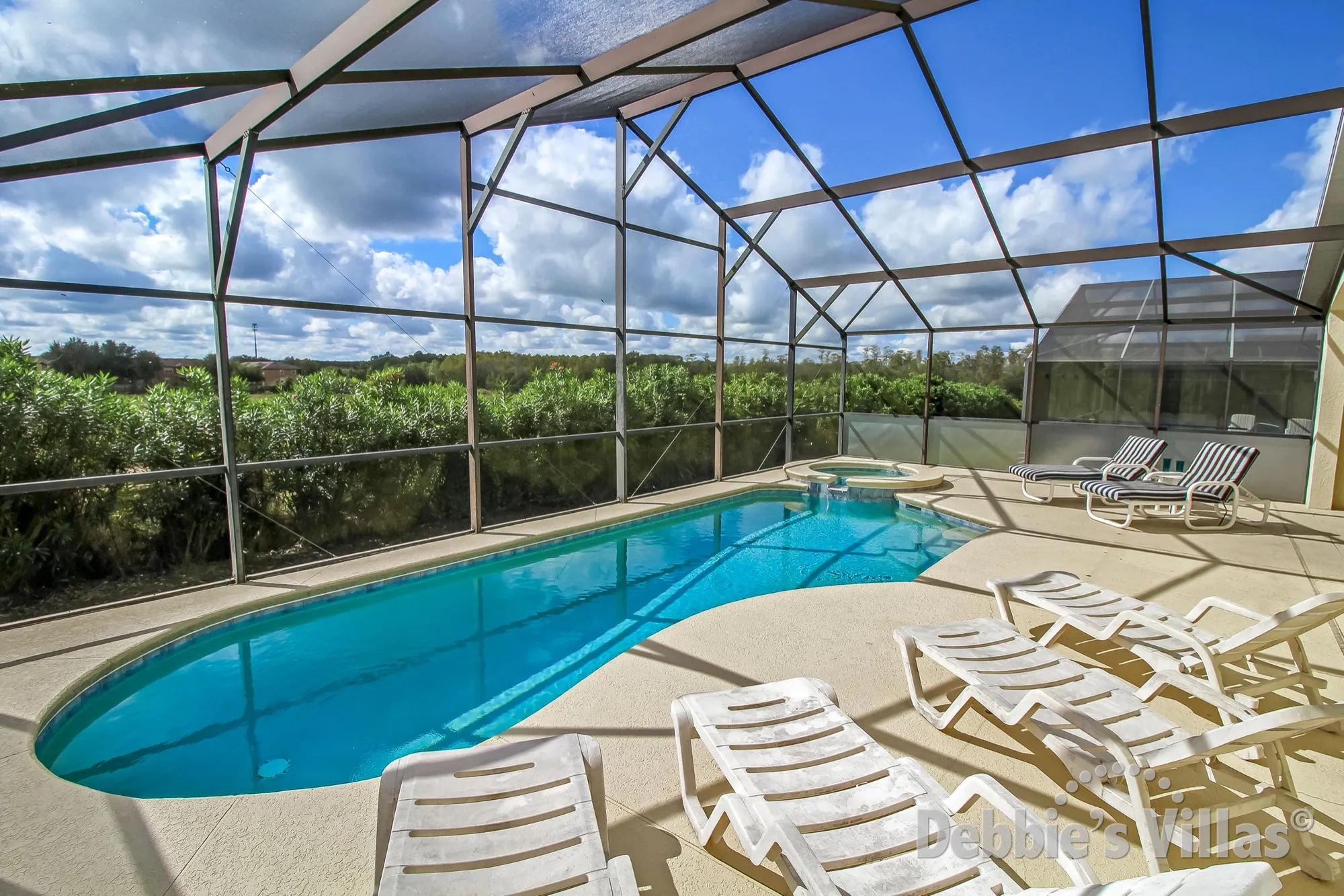 South-facing private pool and spa on the gated Davenport community of Highgate Park on Legacy Park