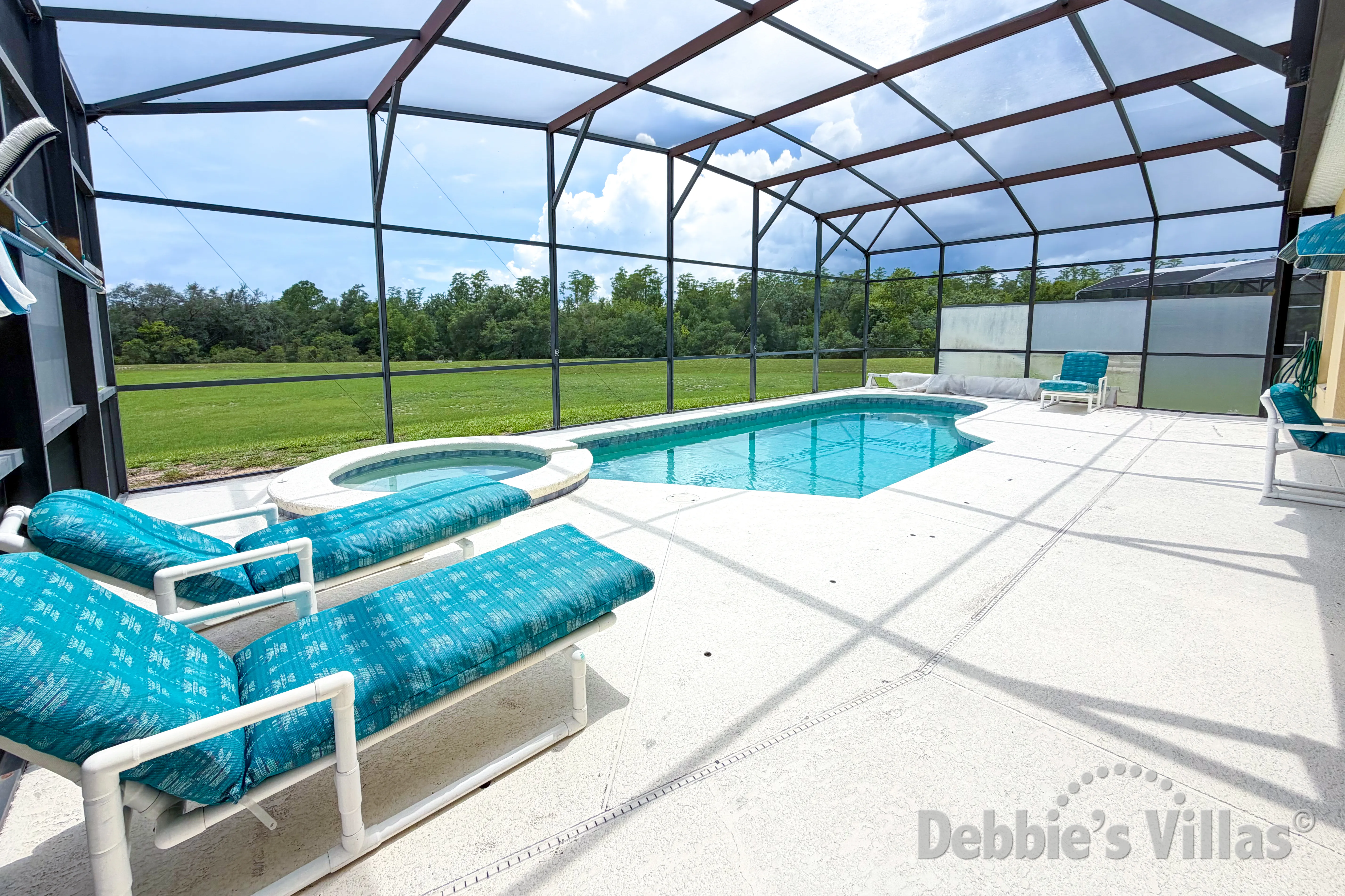 South-facing pool and spa at this vacation villa on Highgate Park at Legacy Park in Davenport