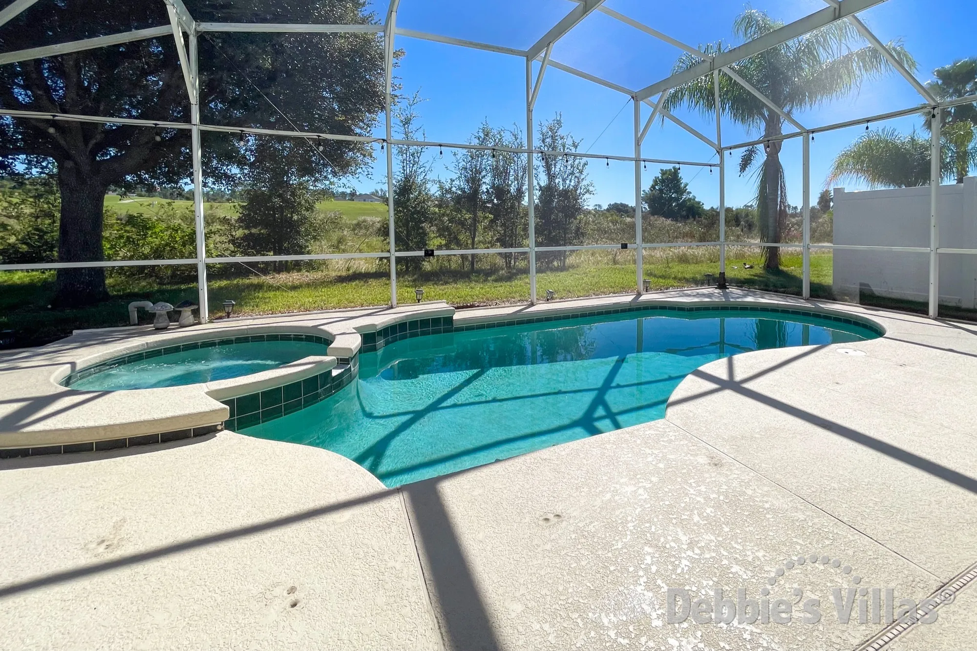 Scenic view from the sun-drenched pool and spa deck at this Highlands Reserve vacation villa