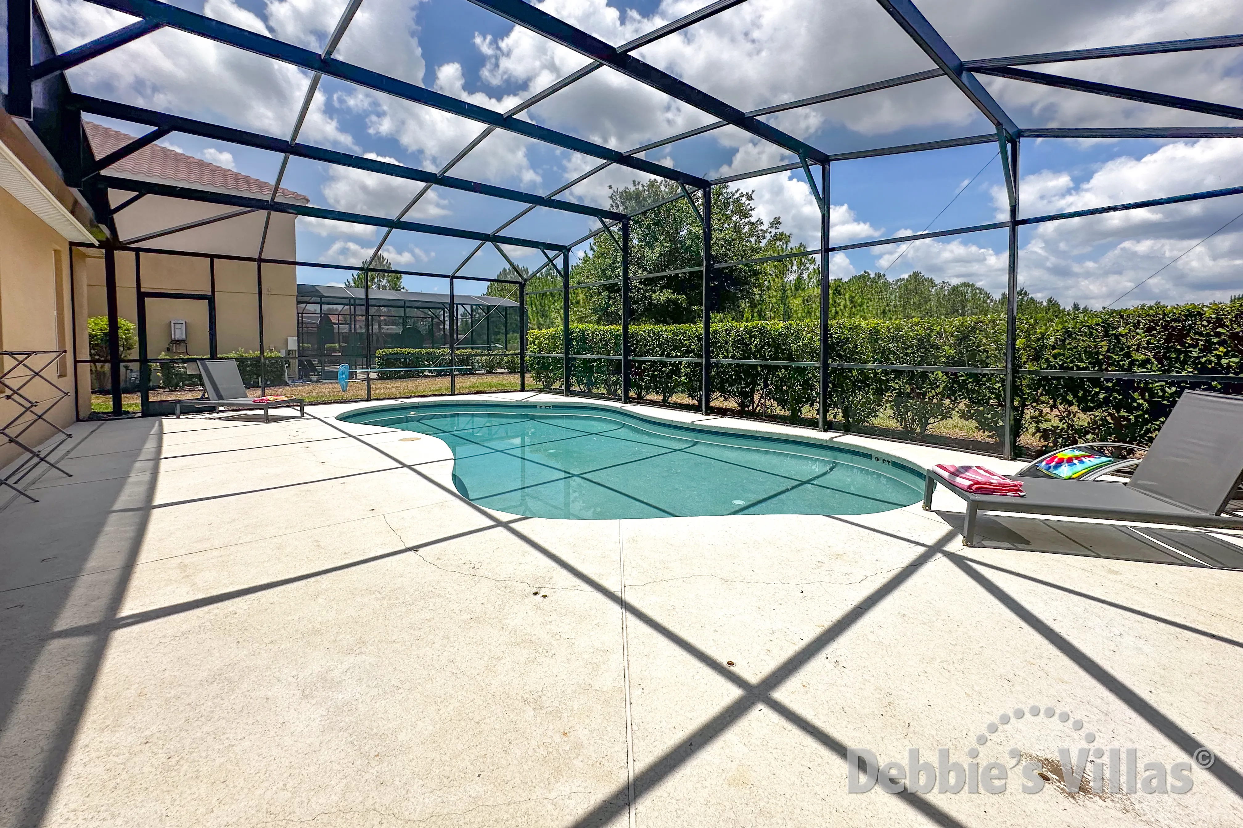 West-facing private pool at this vacation villa on Solterra in Davenport