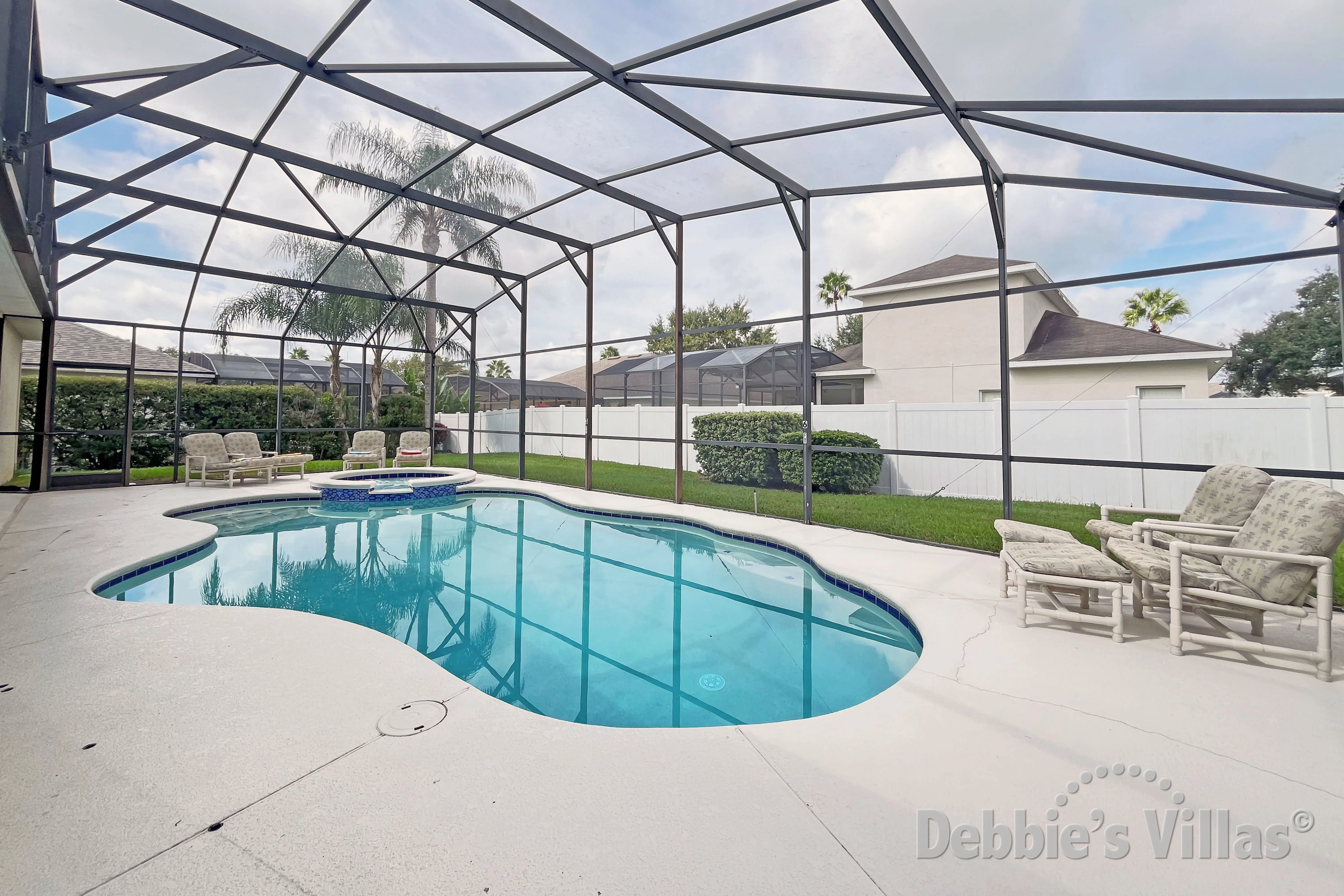 West-facing pool and spa at this Davenport vacation villa