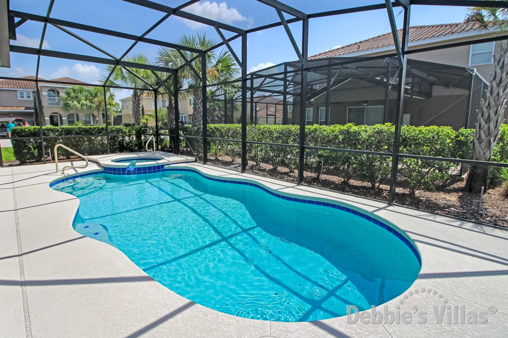 Sun-drenched private pool and spa deck at this Solterra vacation villa