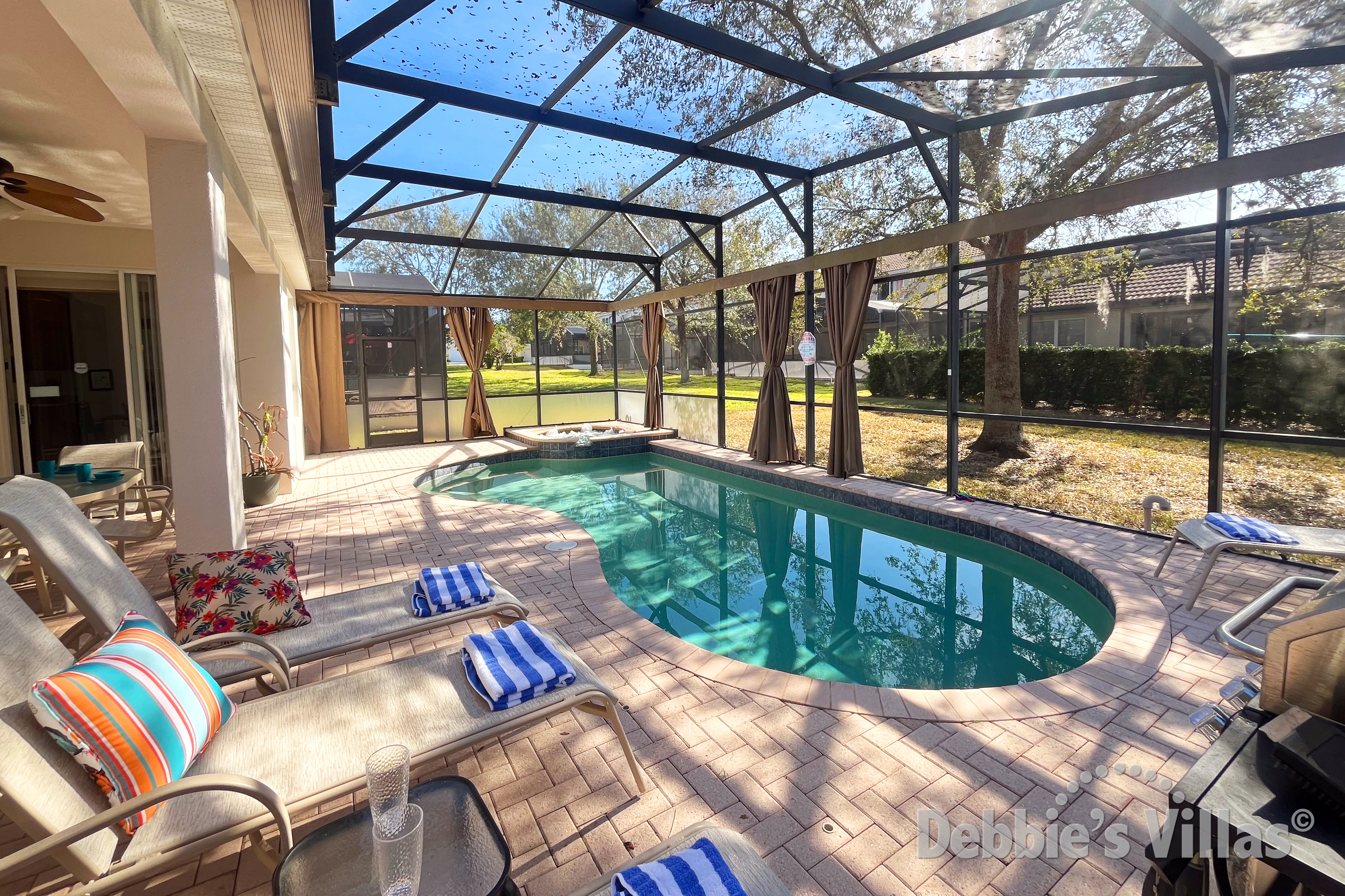South-facing pool and spa at this vacation villa on Windsor Hills in Kissimmee