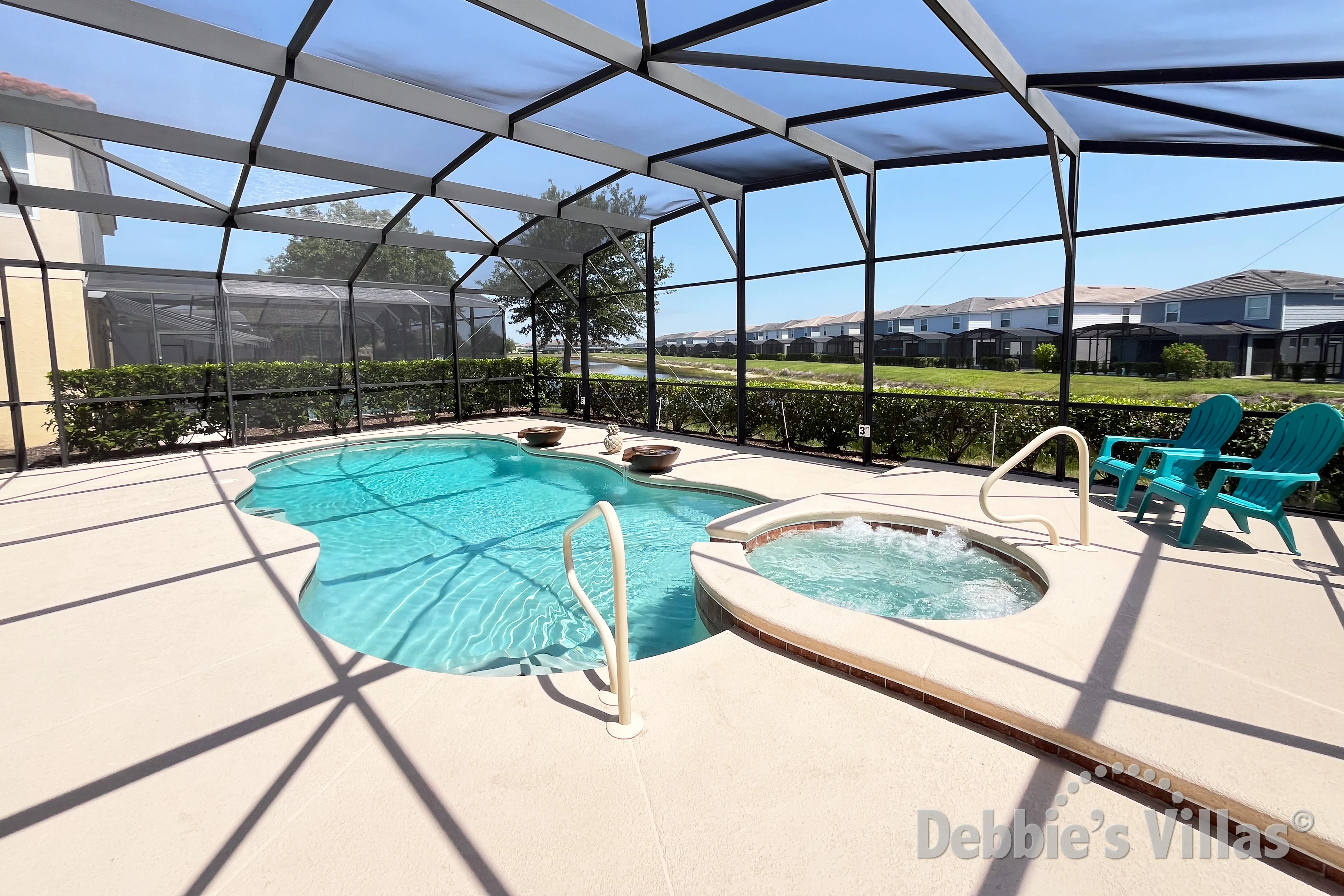 South-facing private pool and spa at this vacation villa on Solterra in Davenport 