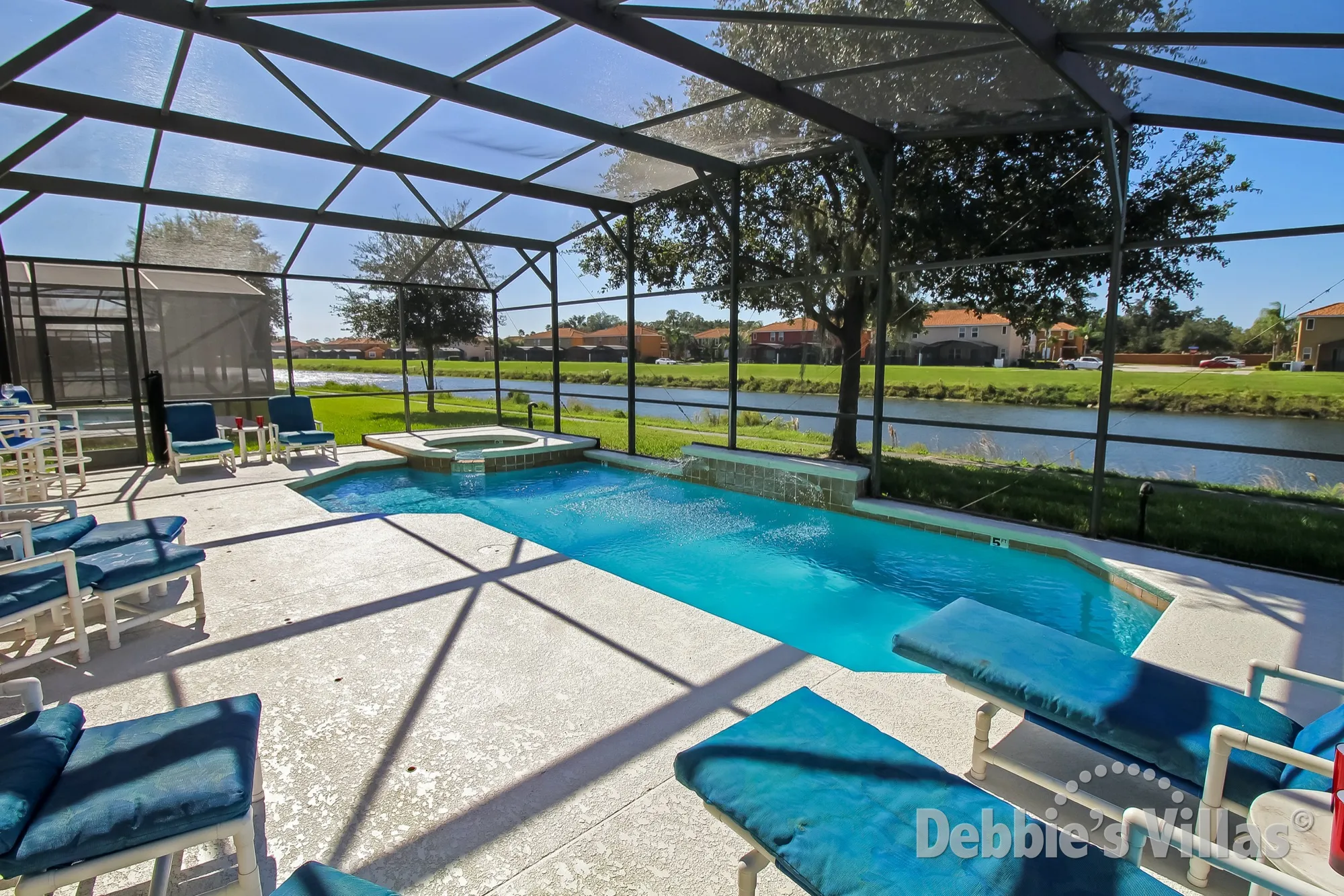 West-facing lake view from the private pool and spa on gated Kissimmee resort of Bella Vida