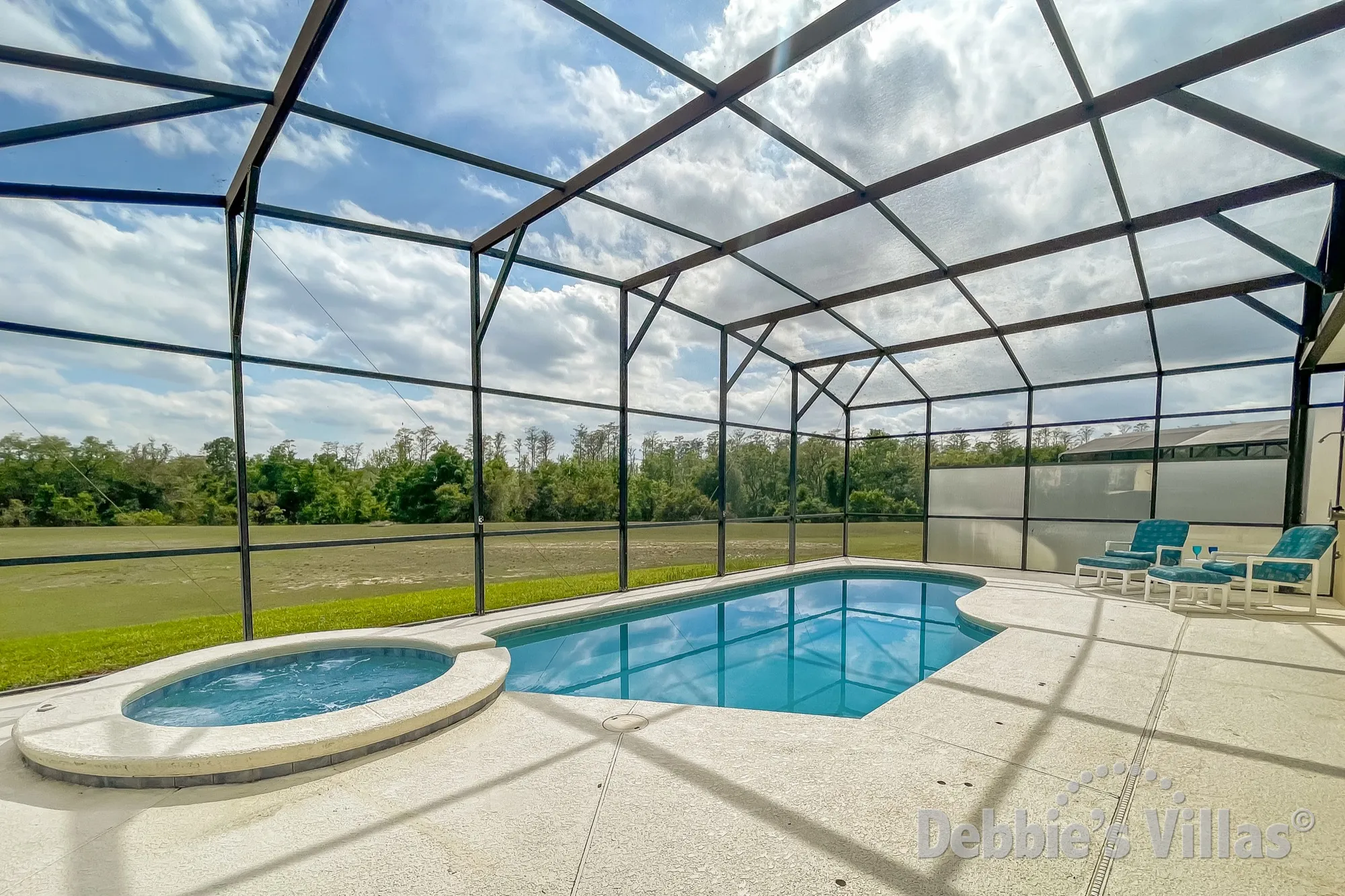 Large south-facing pool and spa with scenic view at this Davenport vacation villa