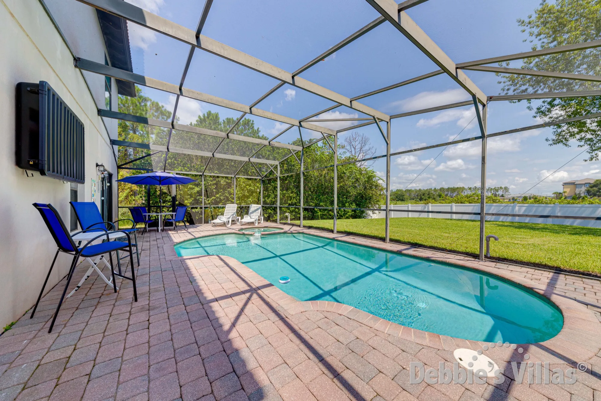 Sun-drenched secluded pool and spa deck at this High Grove vacation villa