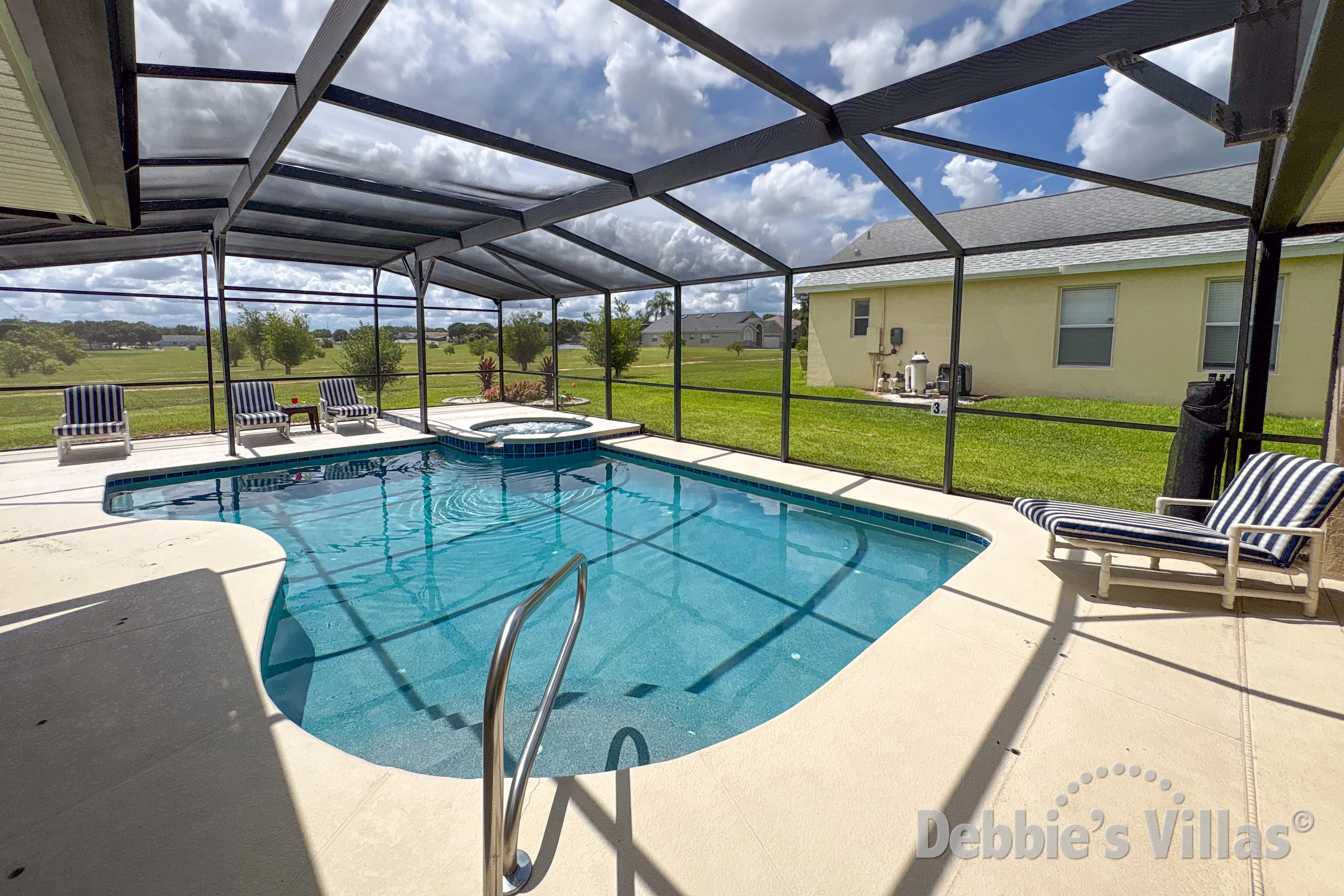 South-facing pool and spa at this vacation villa on Orange Tree in Clermont