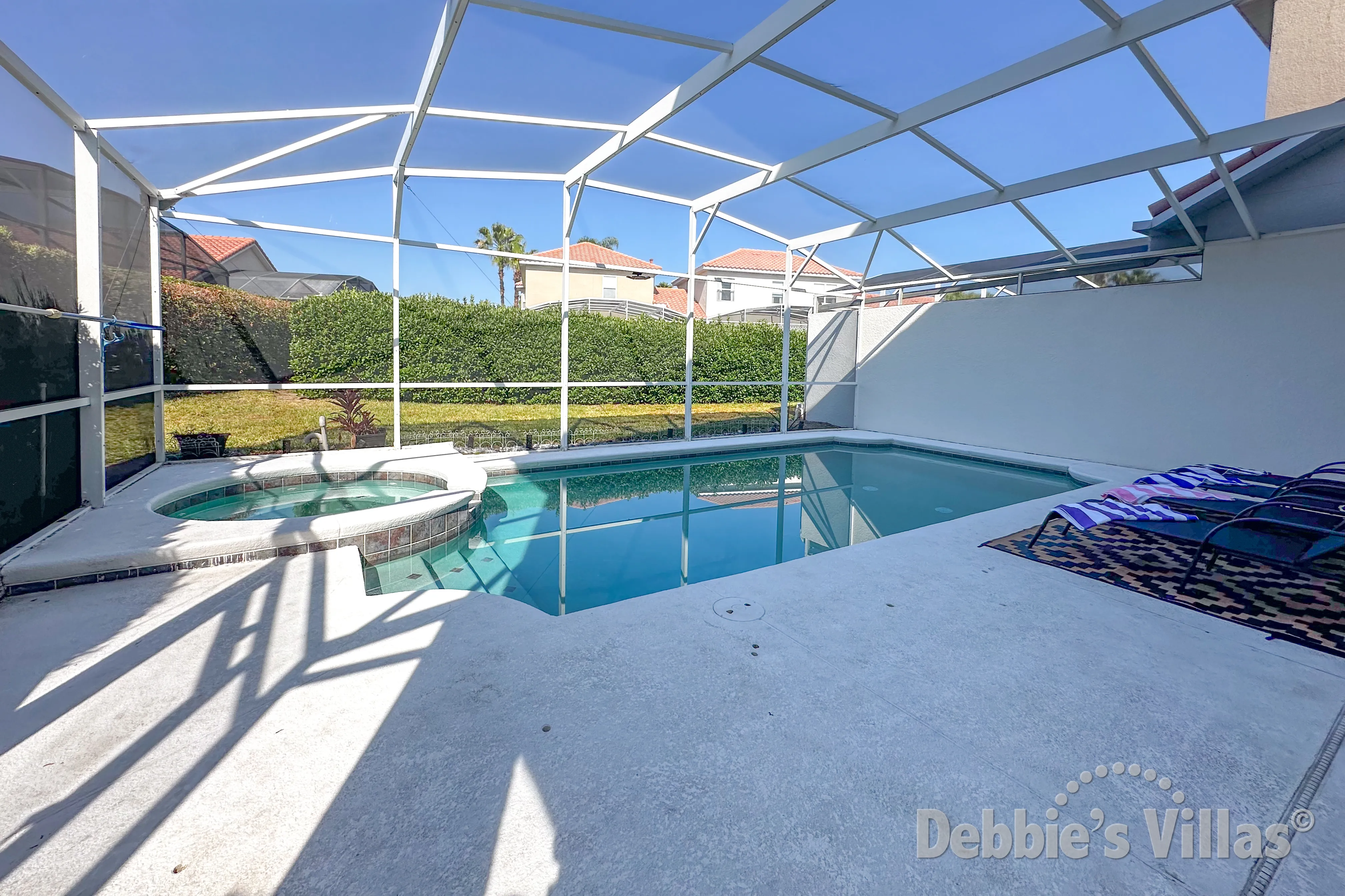 Southwest-facing pool and spa at this vacation villa on Tuscan Hills in Davenport