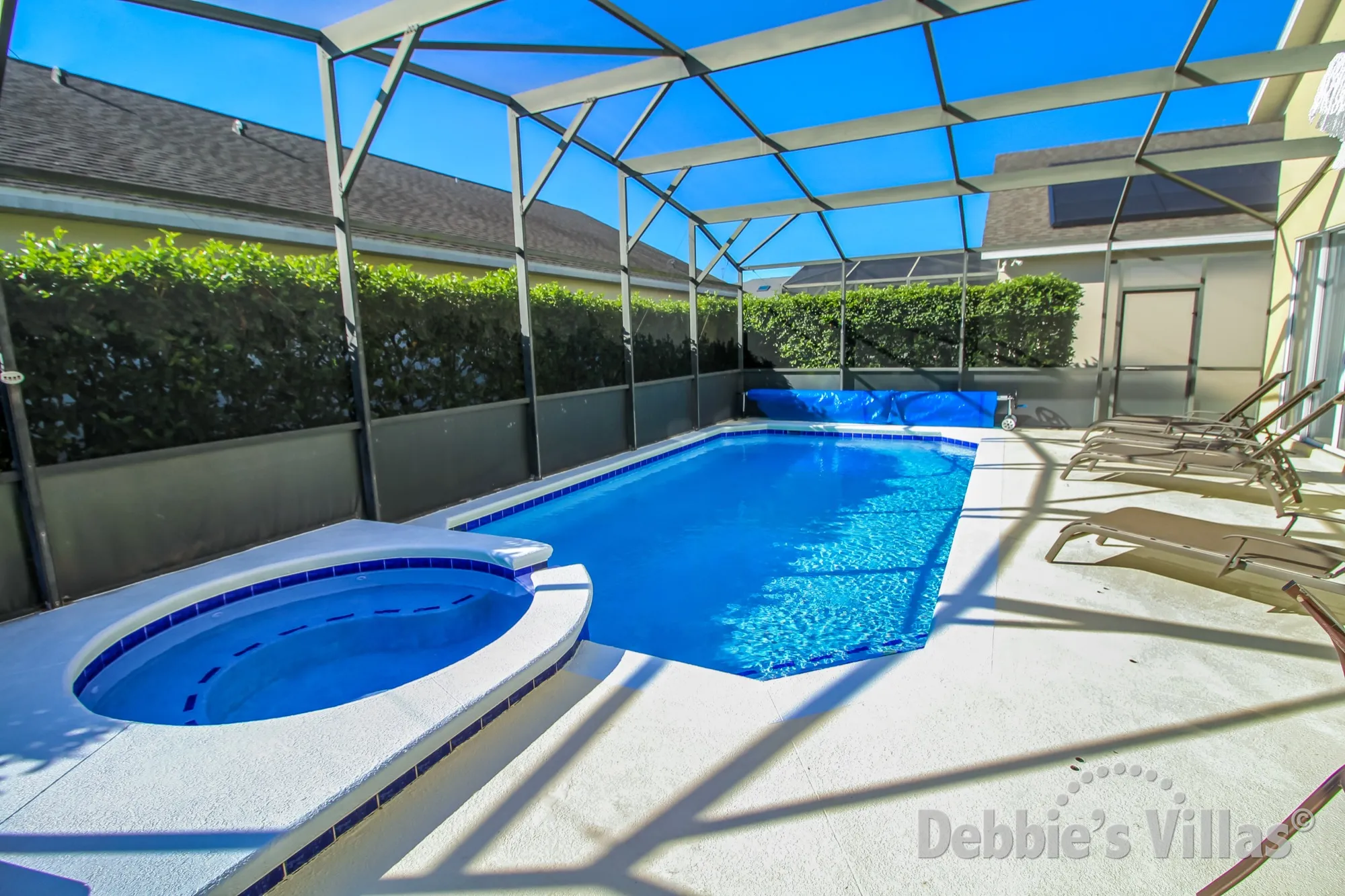 Privacy hedges around the south-facing private pool and spa