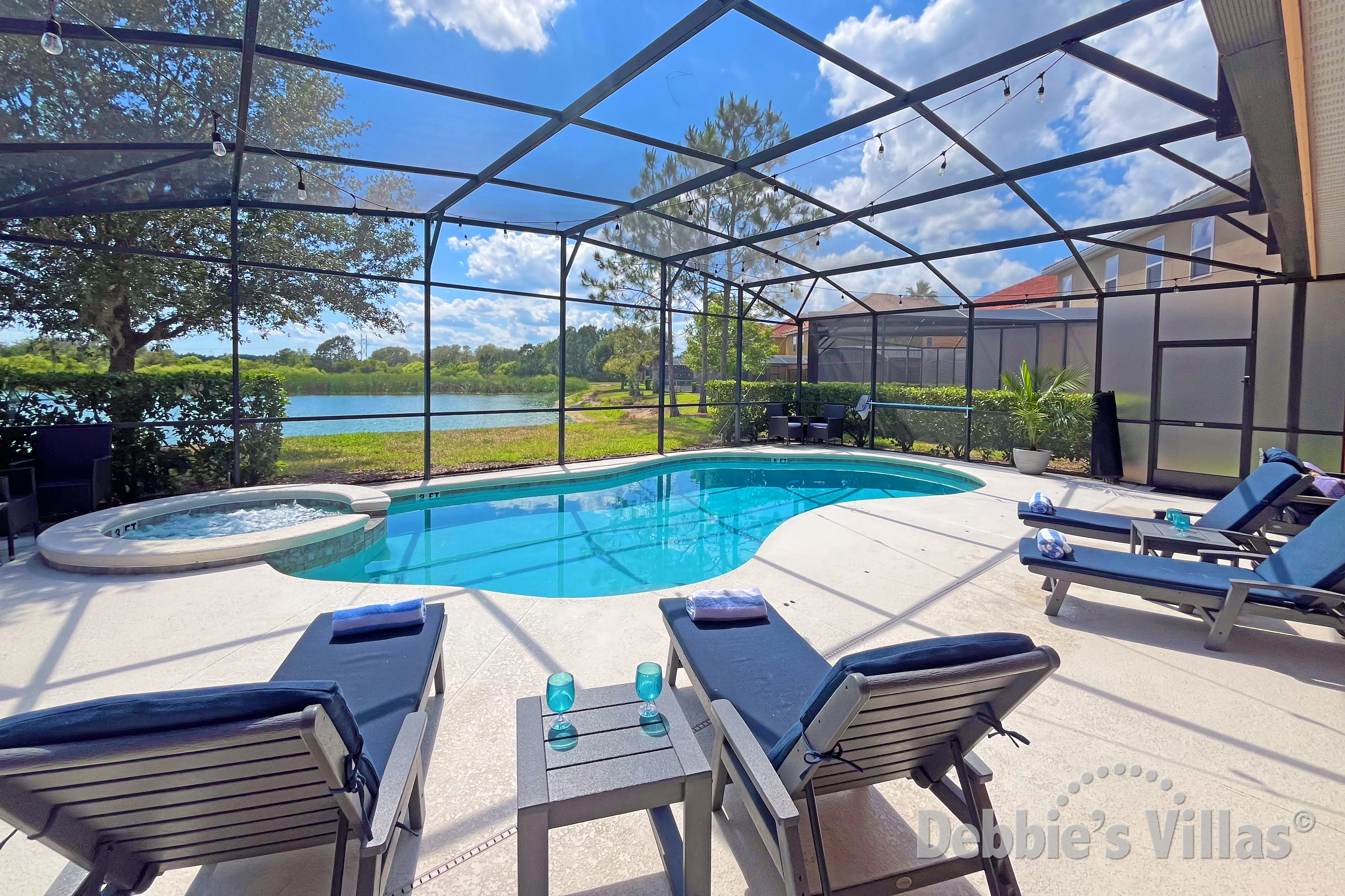 Southwest-facing private pool and spa at this vacation villa on Solterra in Davenport