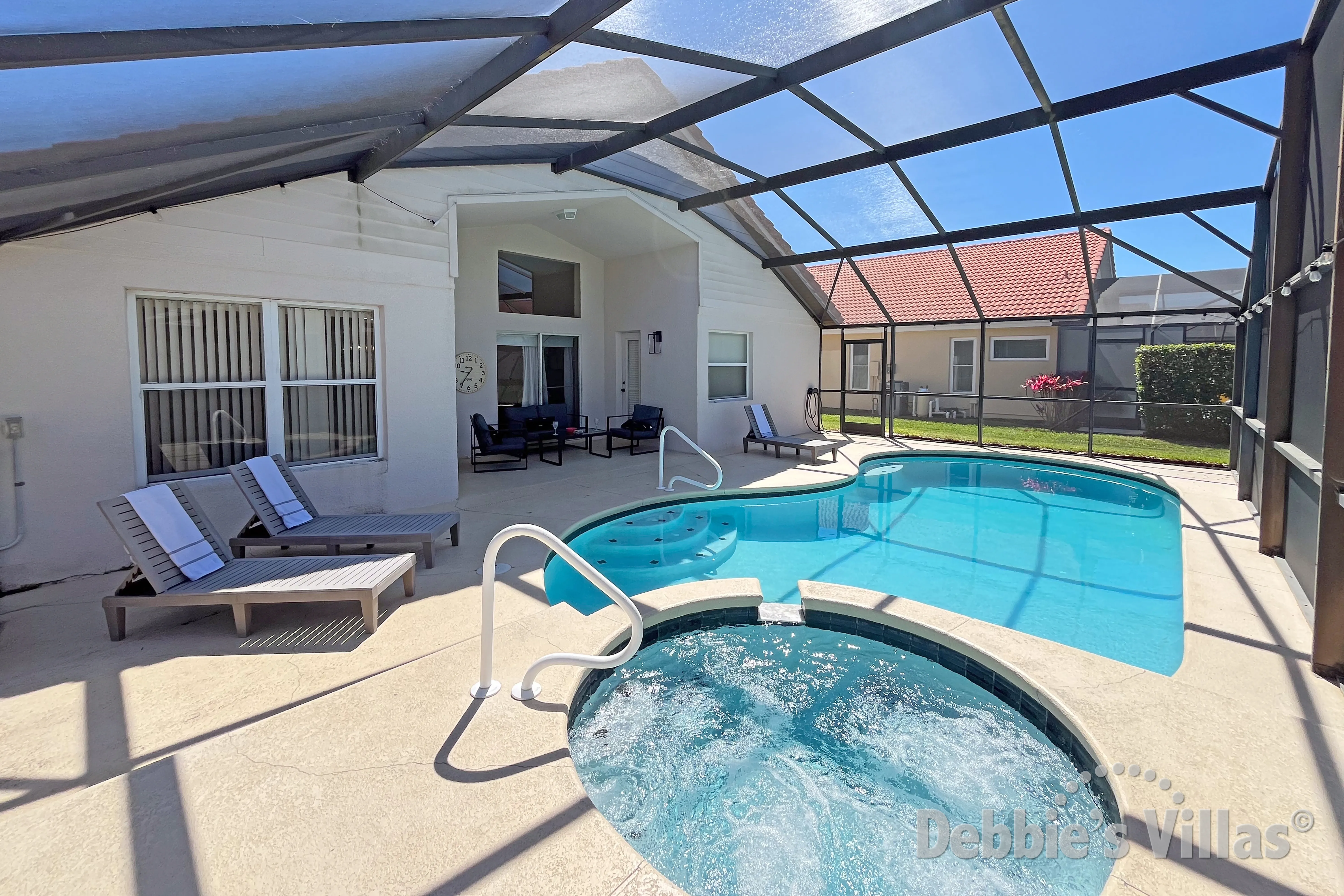 Relax your muscles in the calming spa at this Davenport vacation villa 