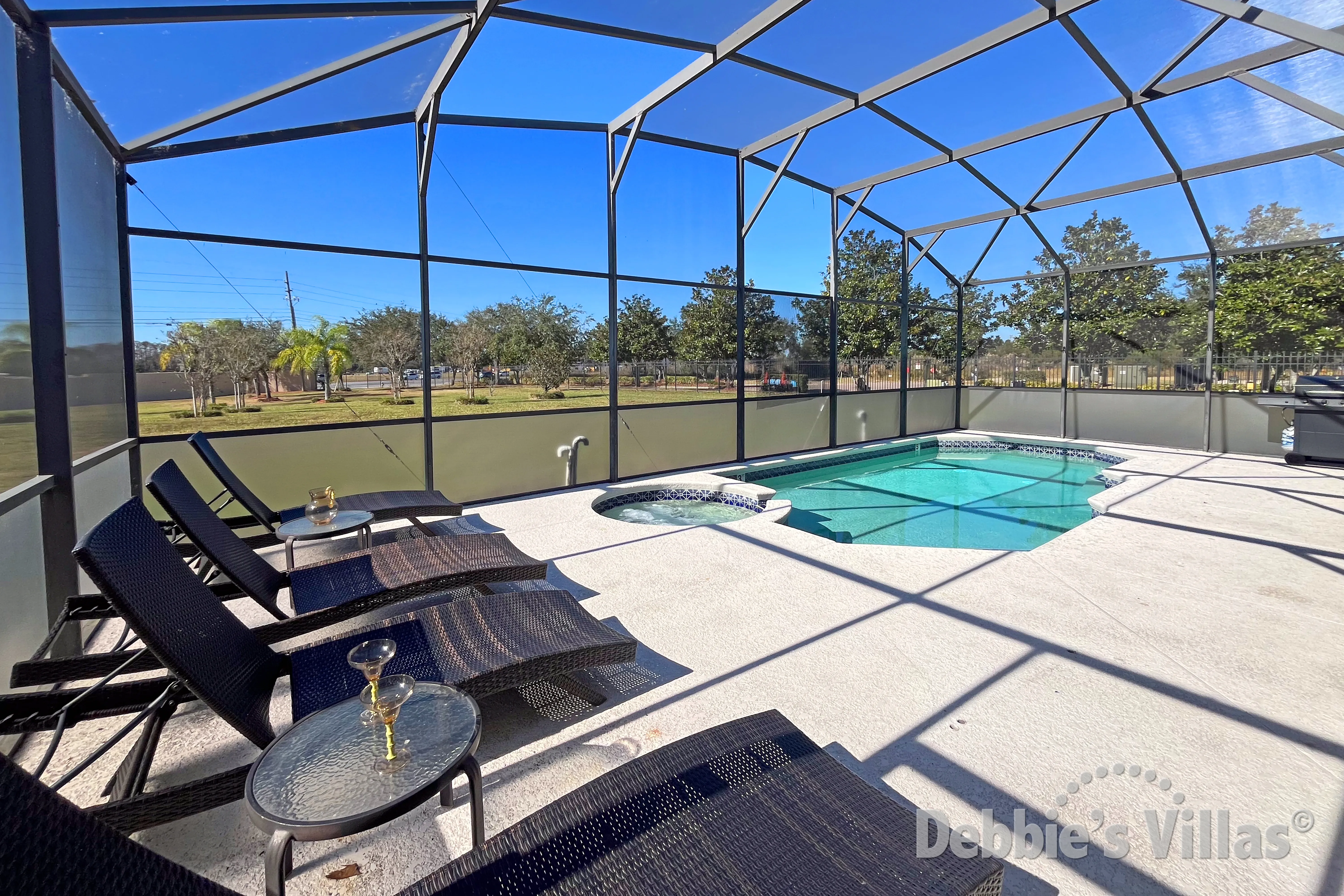 West-facing pool and spa at this vacation villa on Crystal Cove on Poinciana Boulevard in Kissimmee