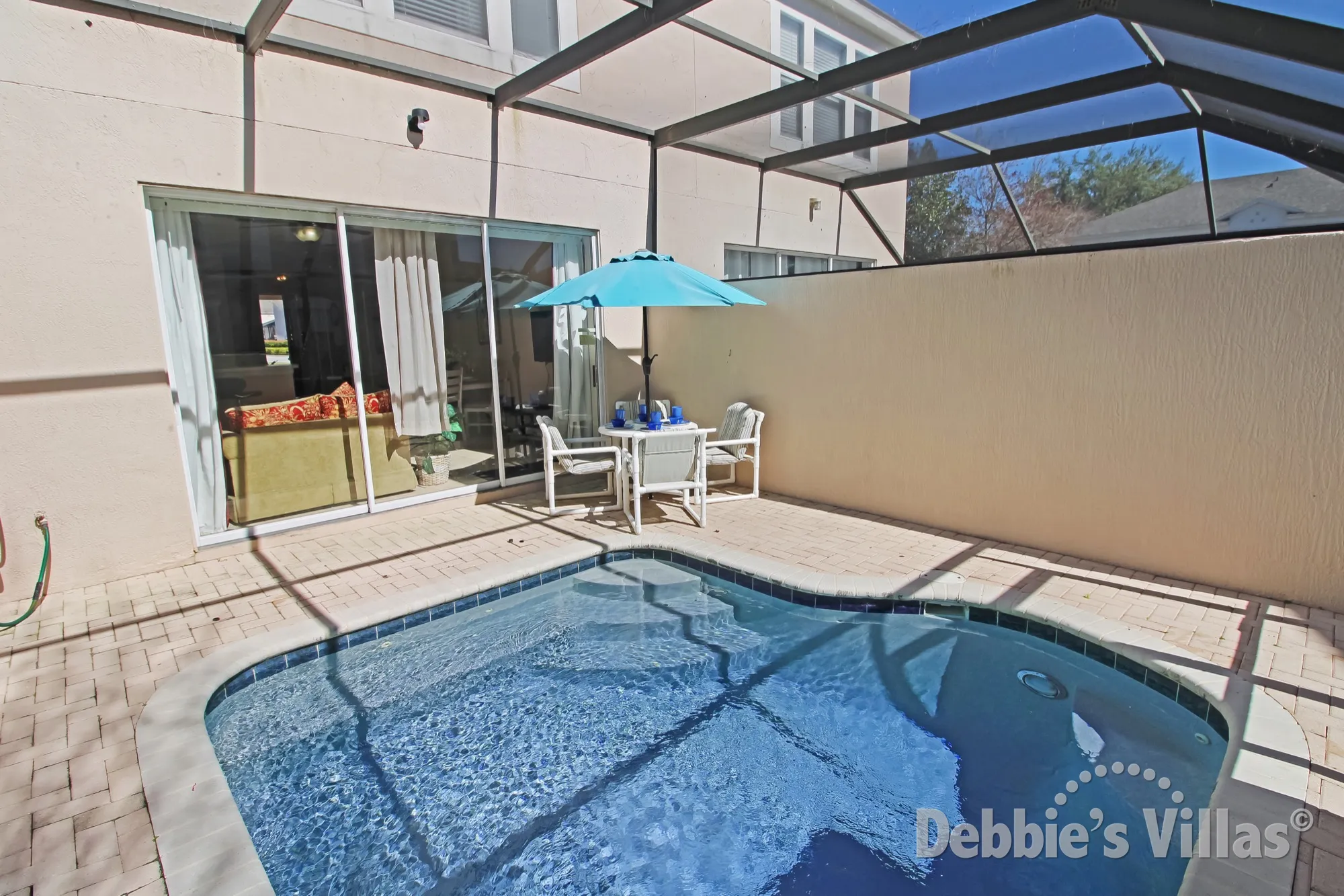 South-facing splash pool at this Windsor Palms vacation home in Kissimmee
