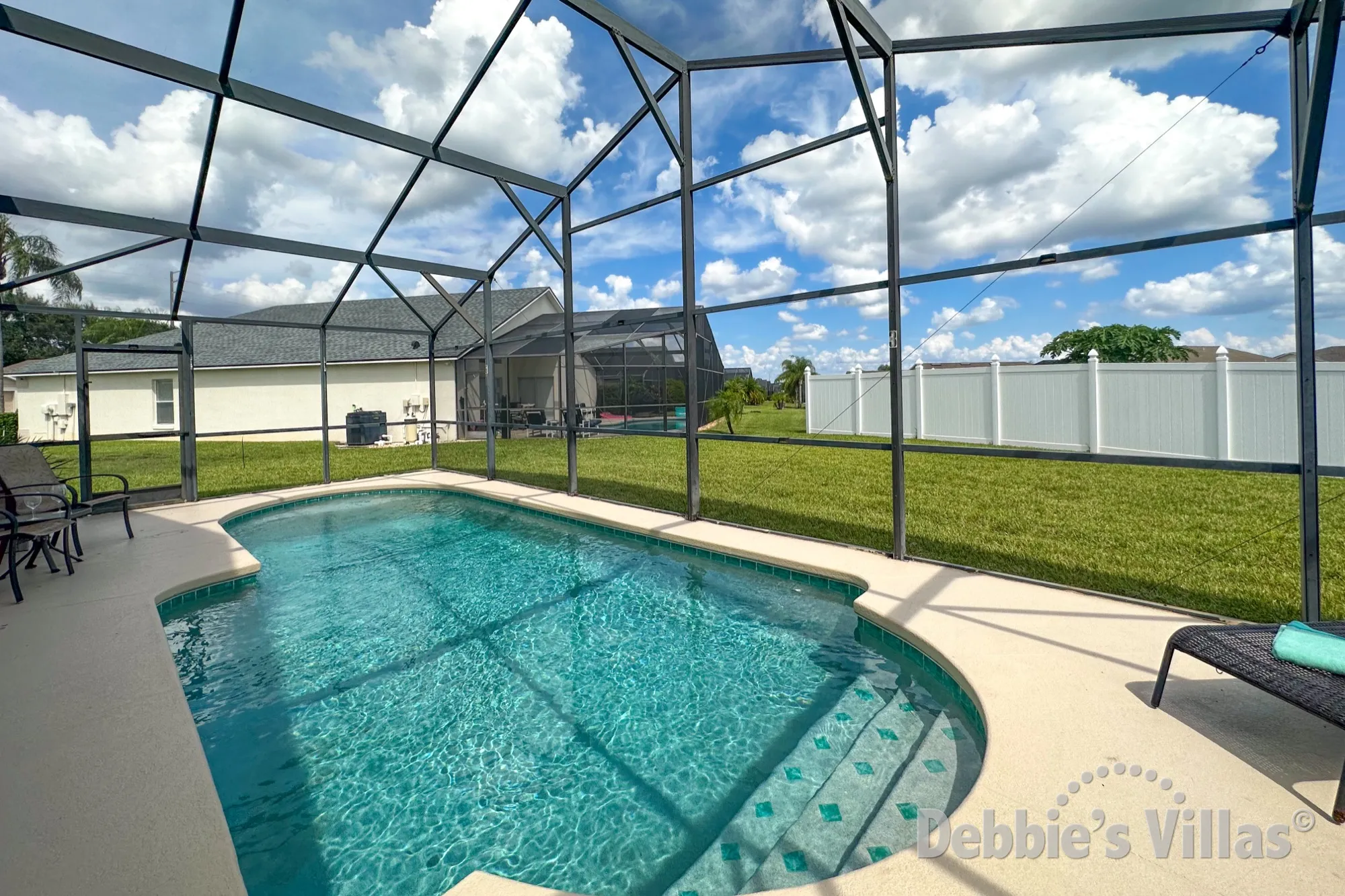 Make everlasting memories in the sun-drenched pool deck of this Davenport vacation villa