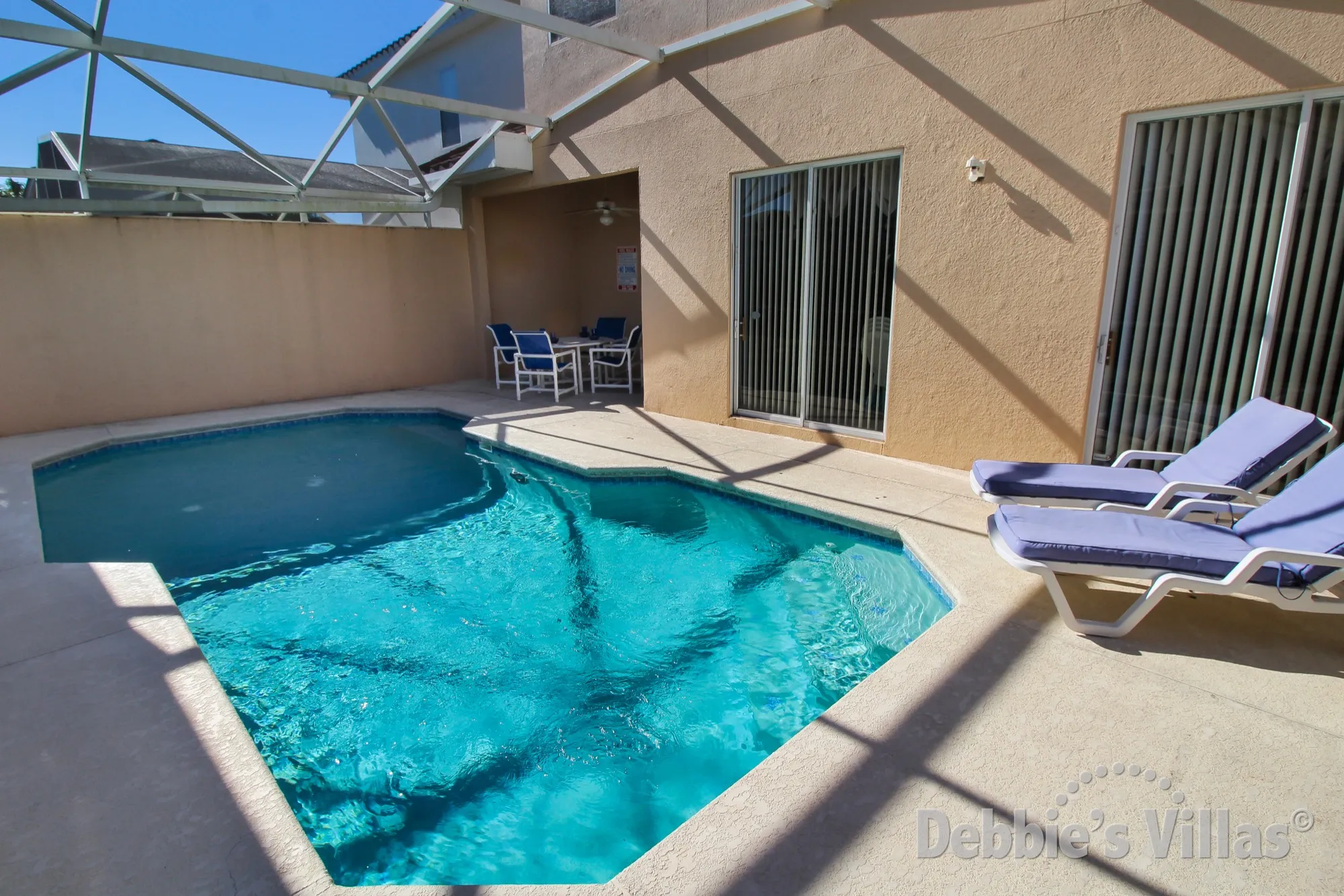 Secluded pool deck at this Tuscan Hills vacation home