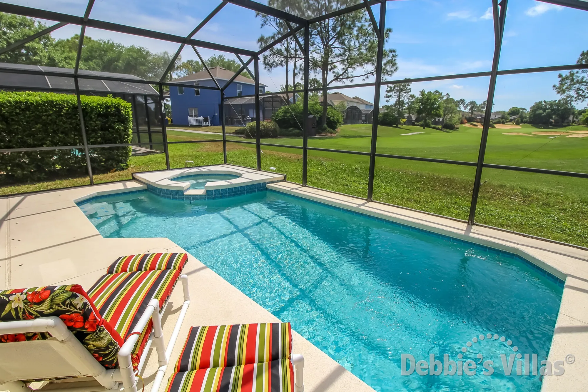 Southern Dunes villa with a golf course view from the south-facing pool deck