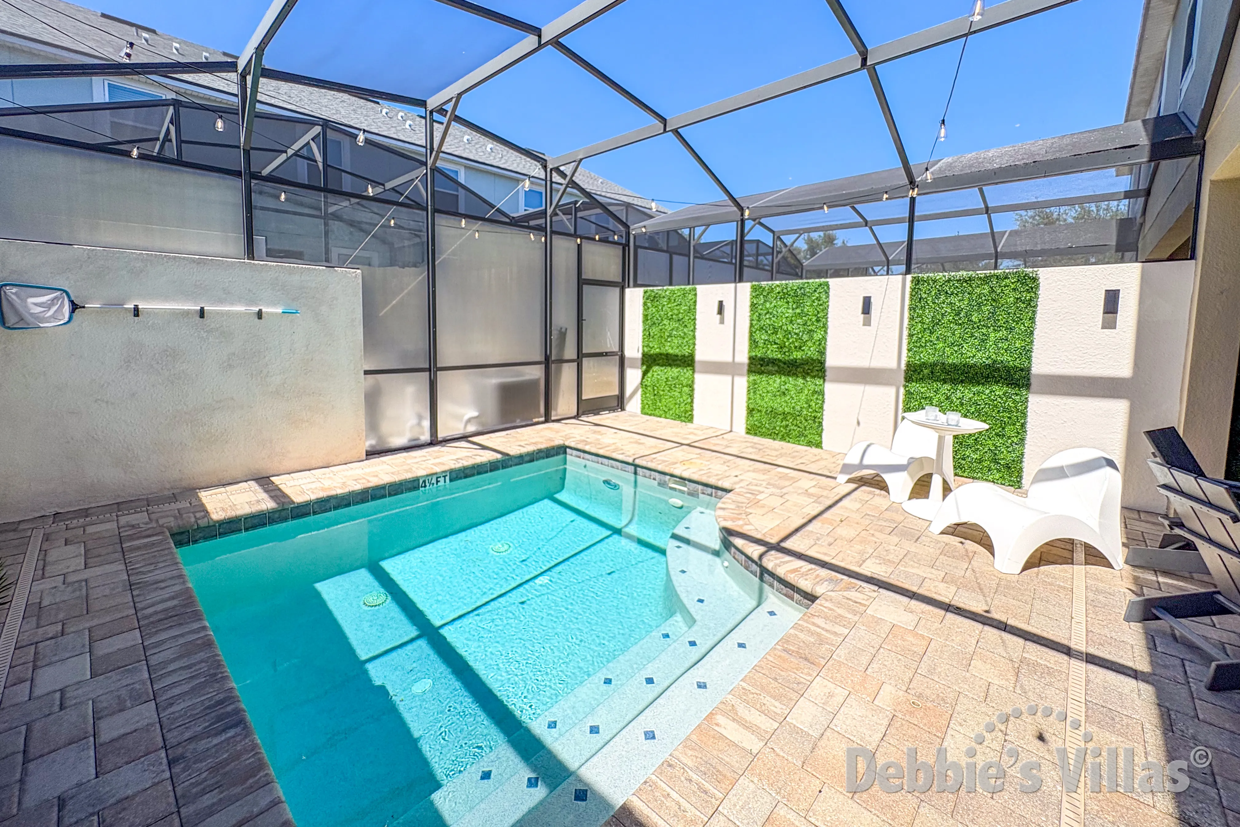 West-facing splash pool at this vacation home on Solara in Kissimmee 