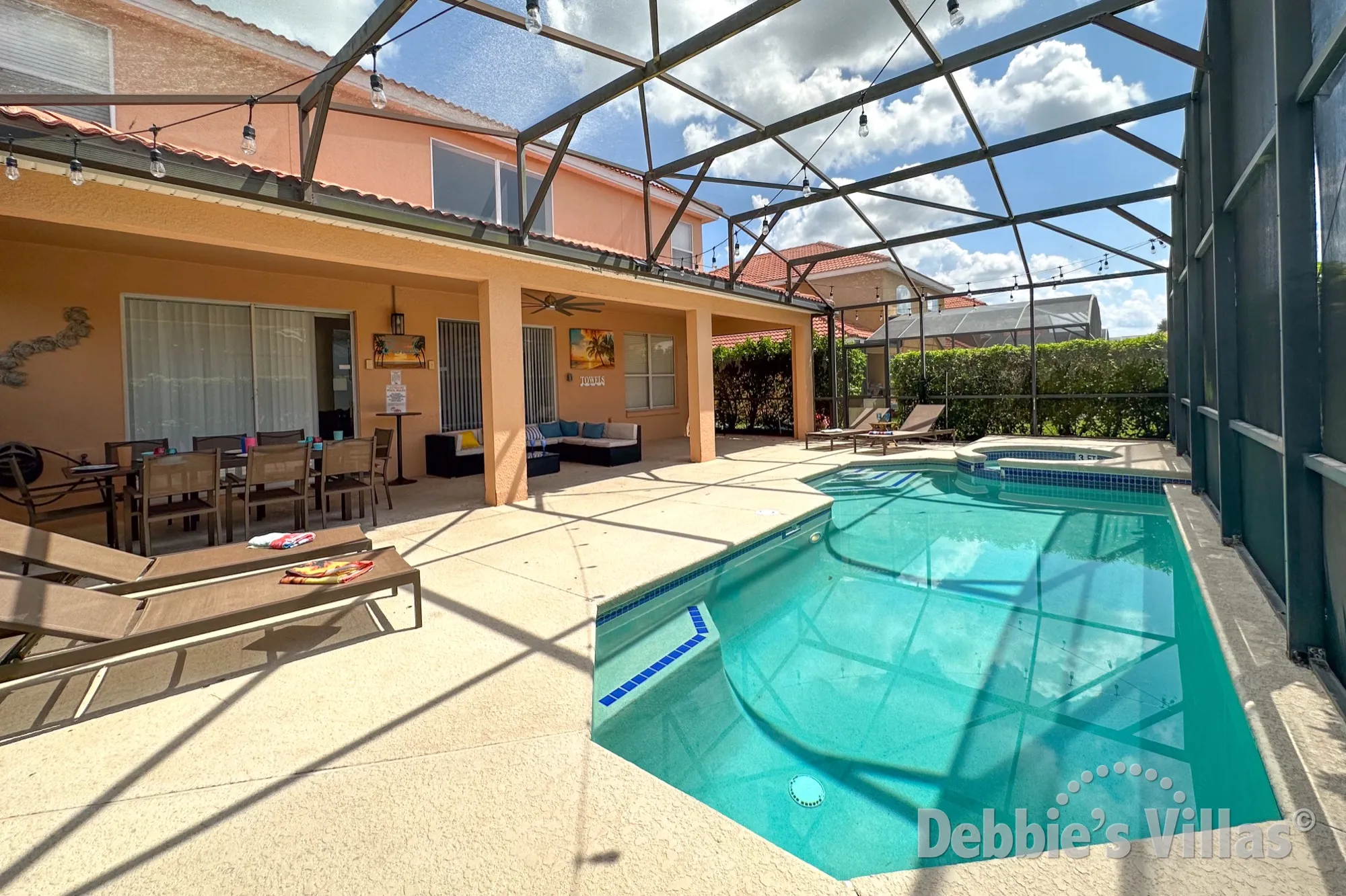 Sun-drenched west facing pool and spa deck at this Solana vacation villa