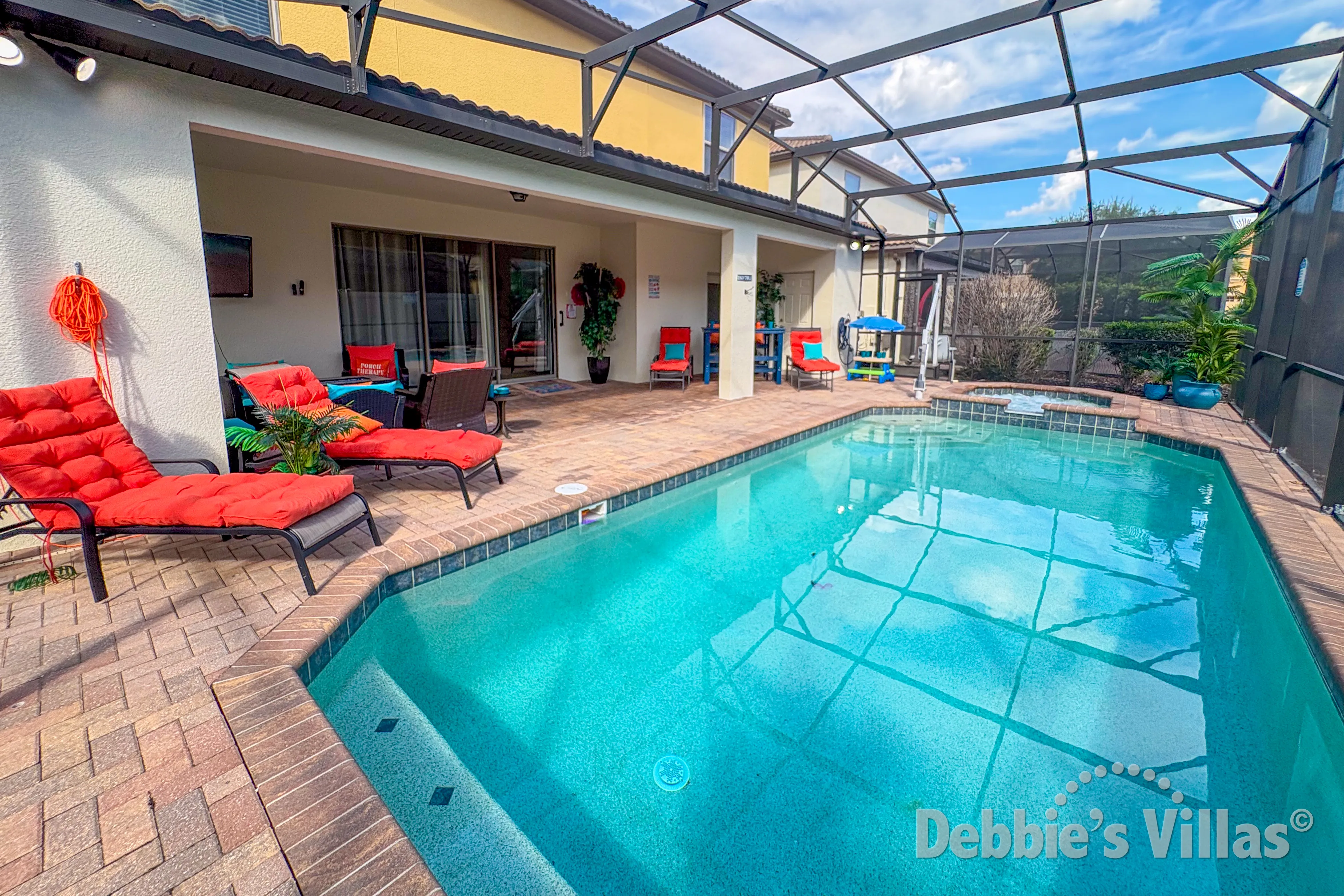 Southwest-facing pool and spa at this vacation villa on Windsor at Westside in Kissimmee 