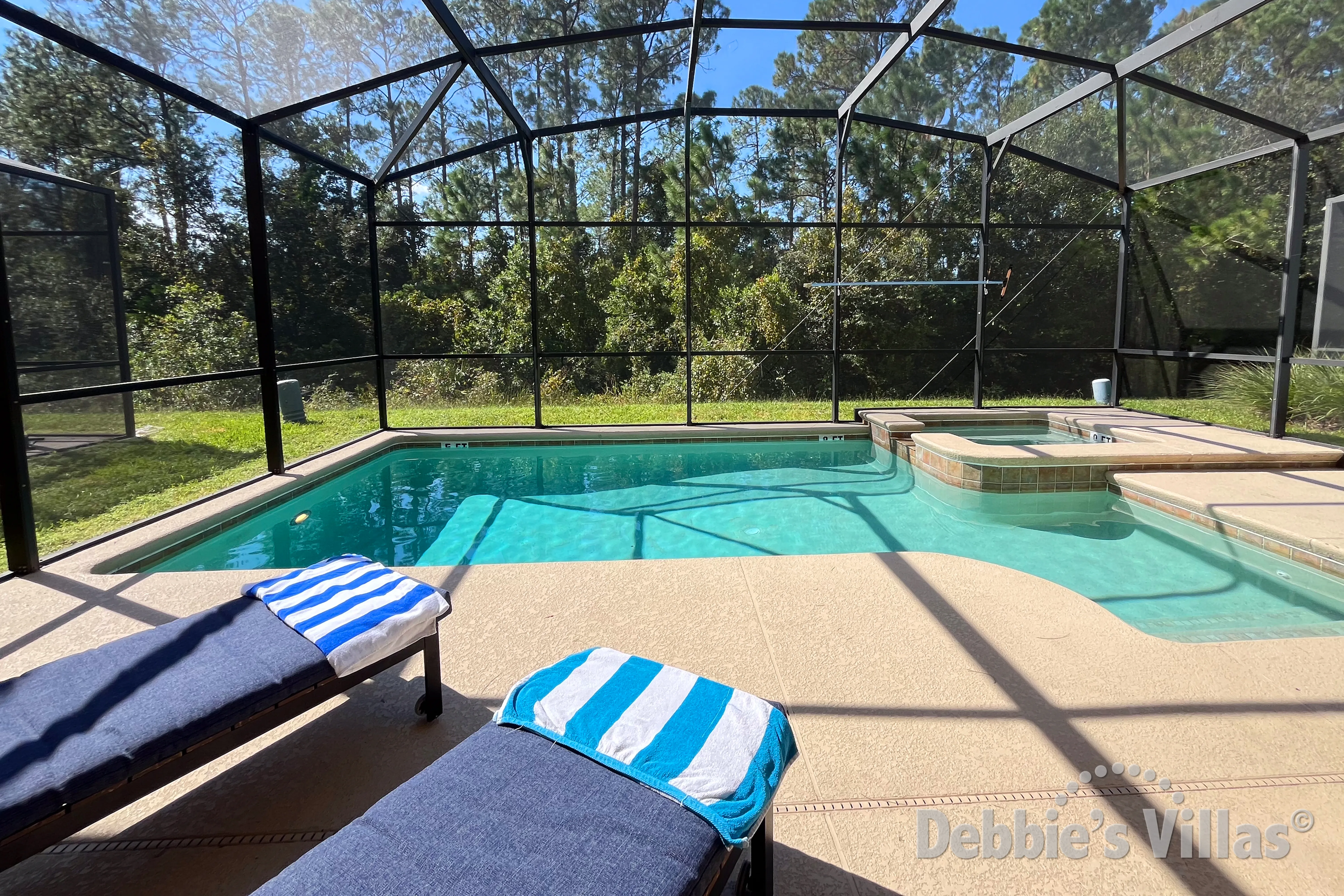 Southwest-facing pool and spa at this vacation villa in Kissimmee