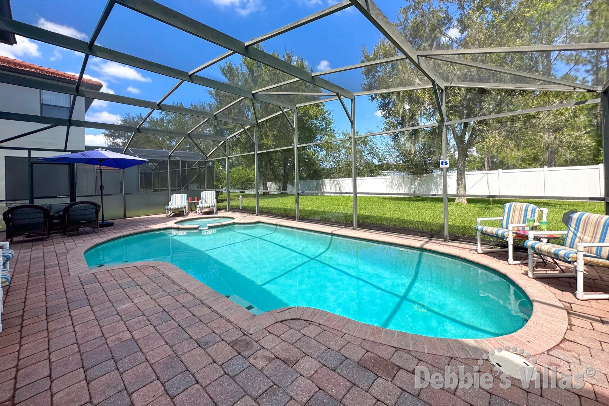 Make memories in the sun-drenched private pool at this Clermont vacation villa