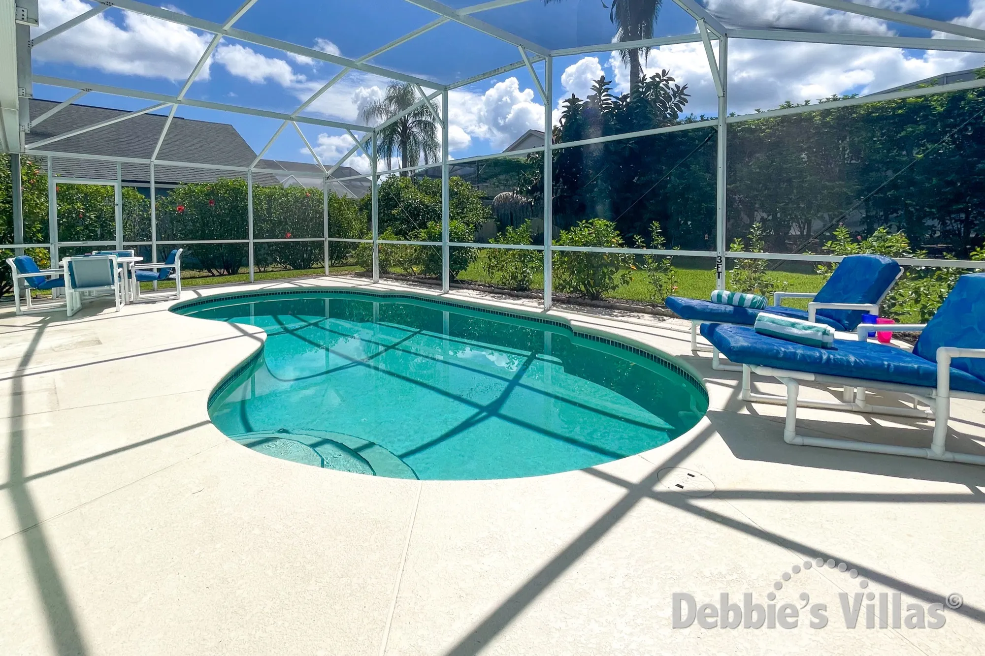 Peaceful, south-facing pool deck at this Kissimmee vacation villa