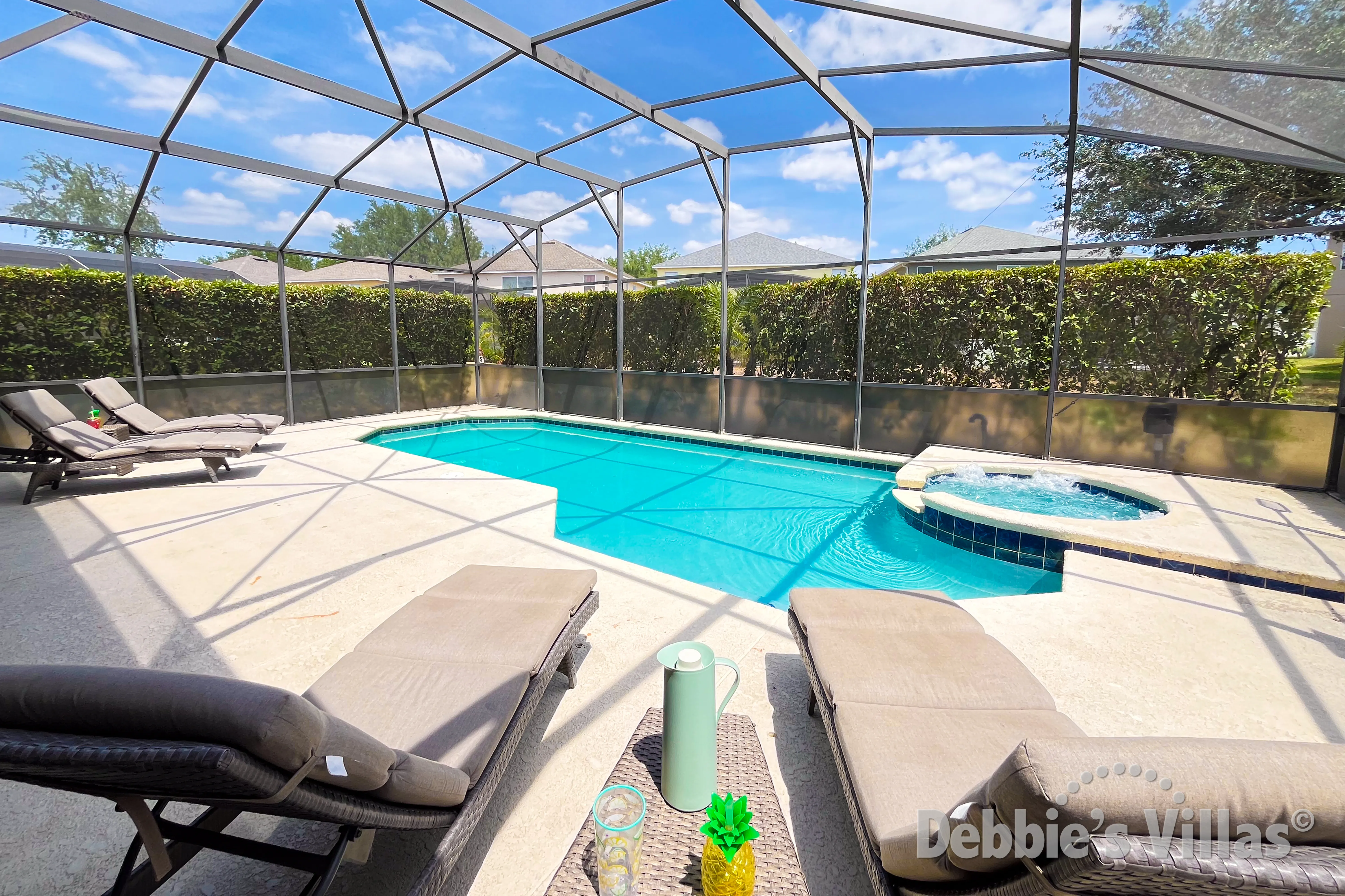 Southeast-facing pool and spa at this vacation villa on Emerald Island in Kissimmee