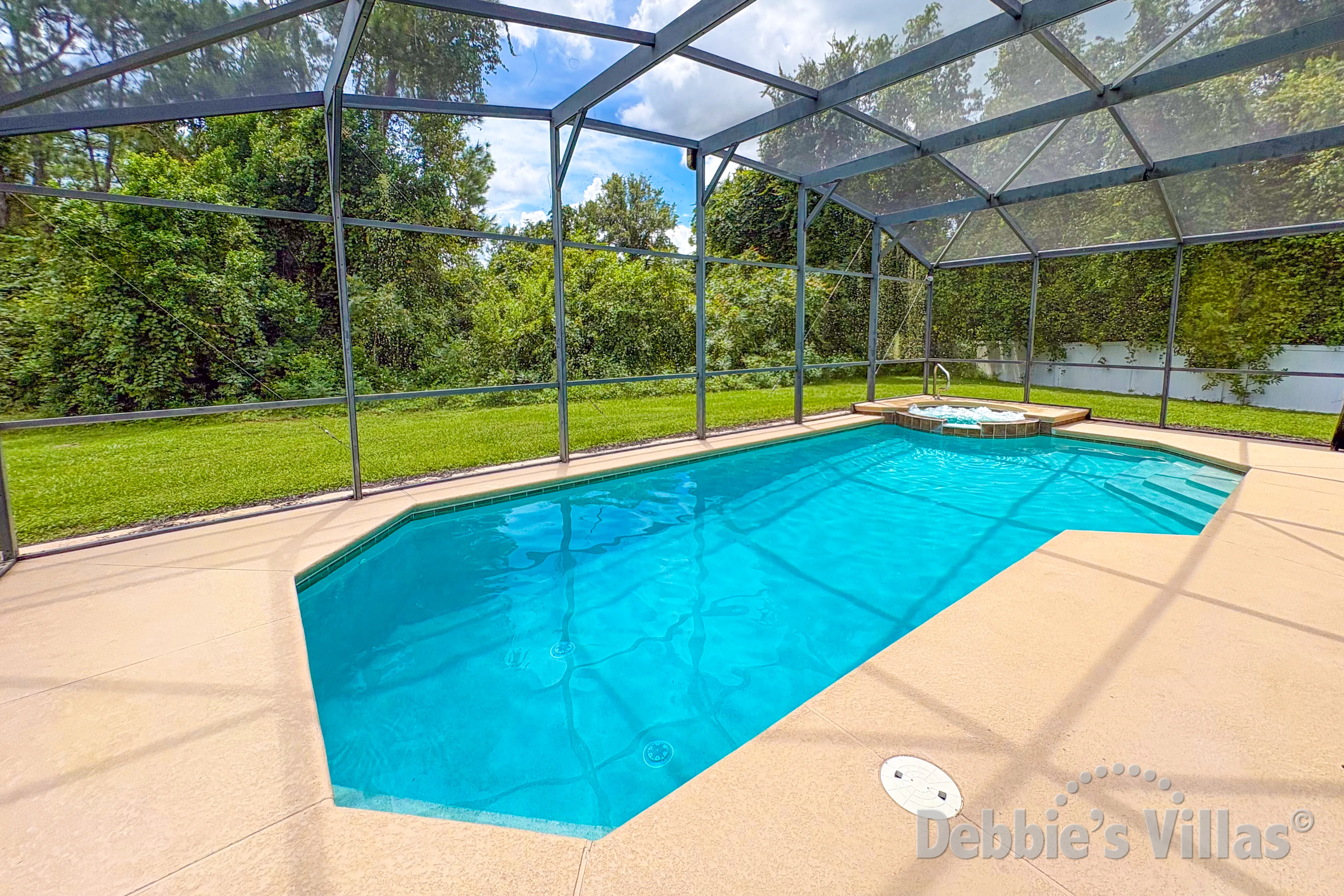 Southeast-facing pool and spa at this vacation villa on Watersong in Davenport 